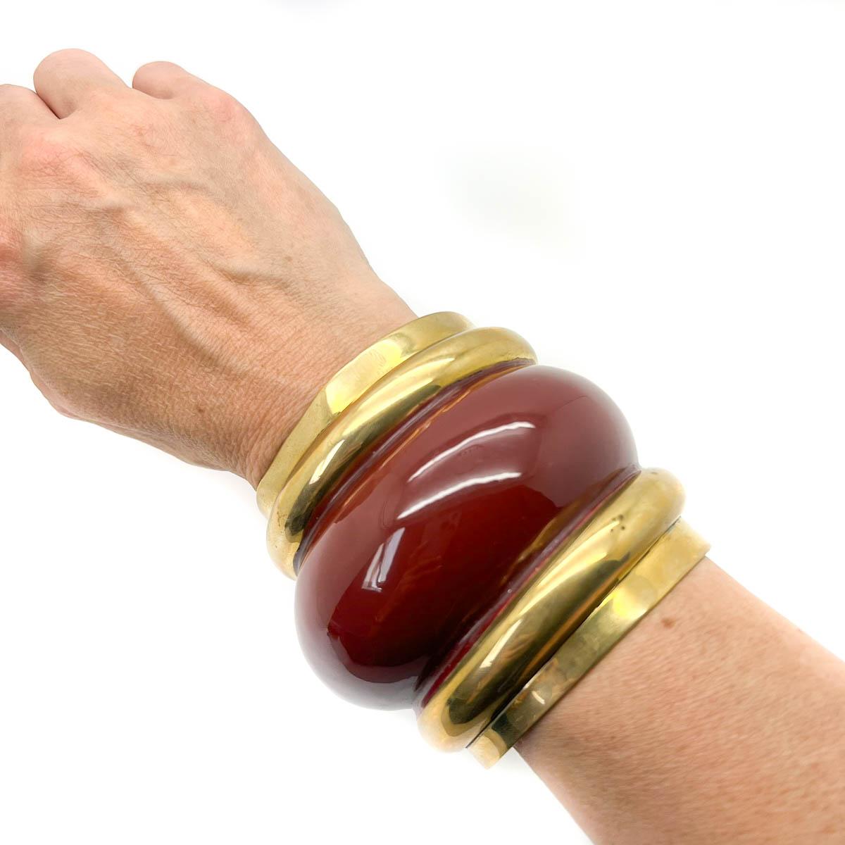 An oversize Vintage Diane von Furstenberg Bangle. This Diane von Fürstenberg Carnelian Runway Cuff is a rare and fabulous find. Famed in the fashion world since the early 70’s for her now iconic wrap dress, Diane von Furstenberg’s brand is