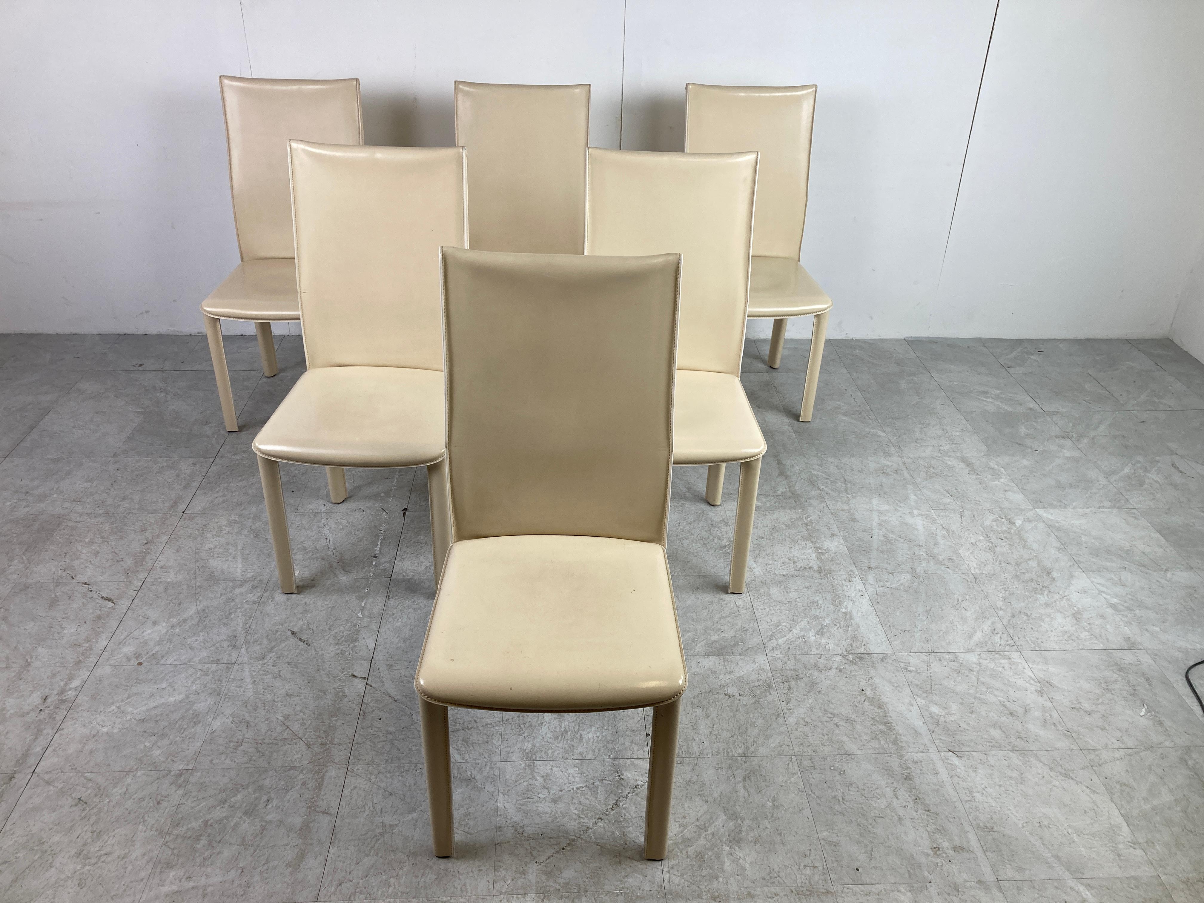 Vintage white/cream leather dining chairs by Arper Italy.

High quality and sturdy stiched leather dining chairs with a timeless design. 

These are the model with the higher backrests.

Cool stitched leather detail at the back of the