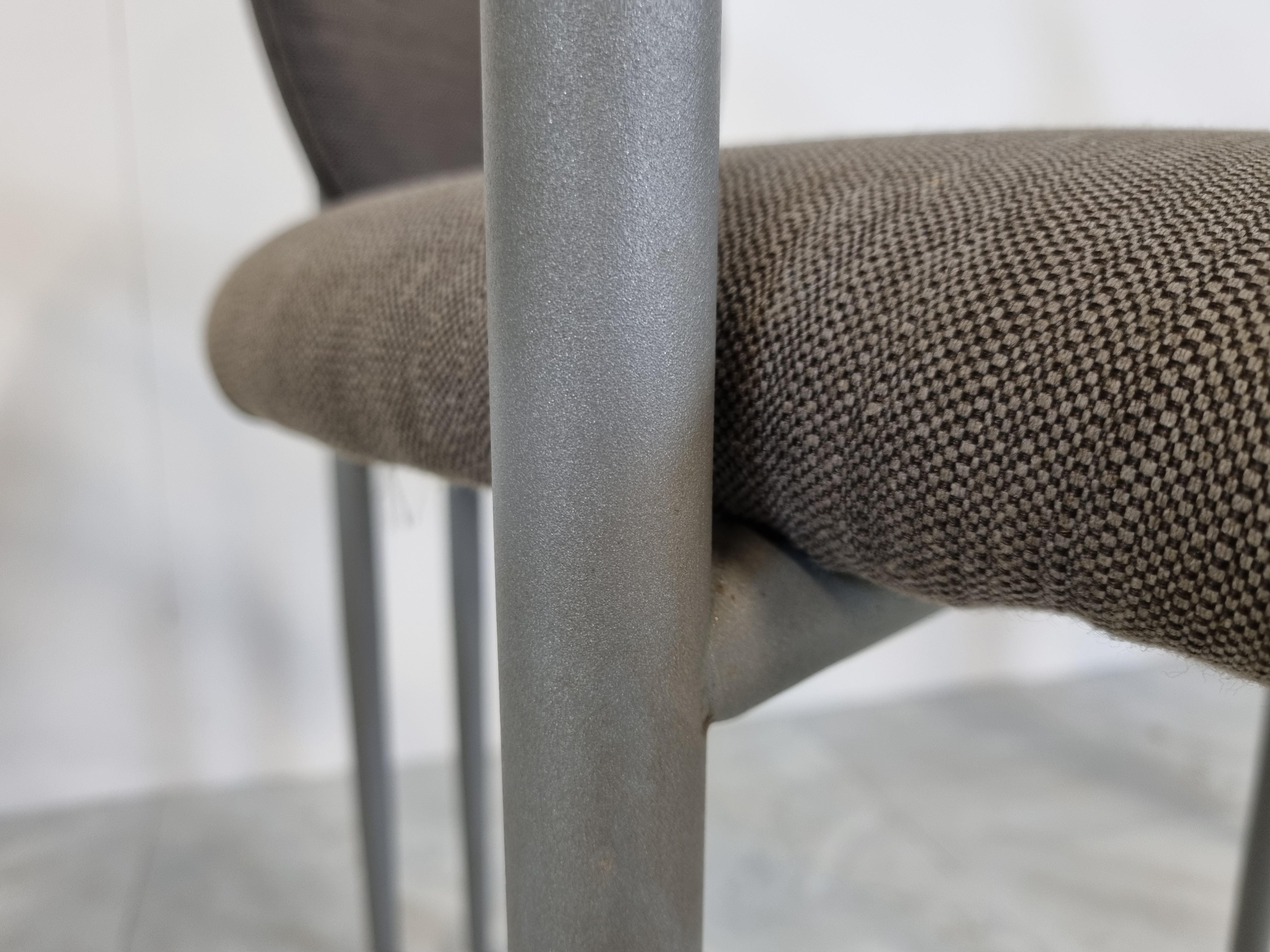 Set of four elegant dining room chairs manufactured by Belgochrom.

Nicely designed metal frames with elegant legs. Uphosltered in grey fabric with powdercoated frames.

Belgochrom used to produce high end furniture and was the higher