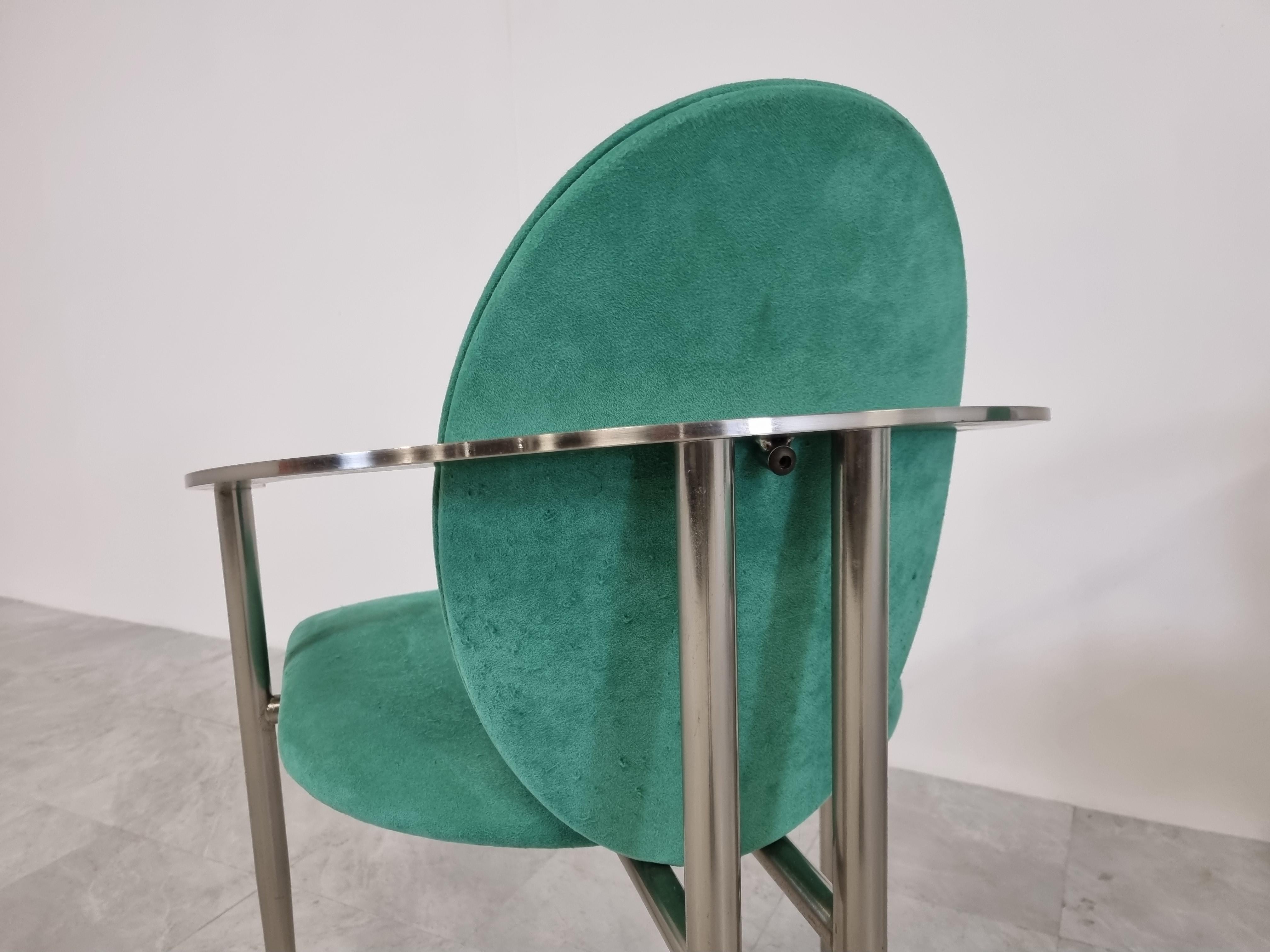 Set of four elegant dining room chairs manufactured by Belgochrom.

Nicely designed metal frames with elegant legs. Green suede upholstery.

Belgochrom used to produce high end furniture and was the higher price-range furniture in Belgium
