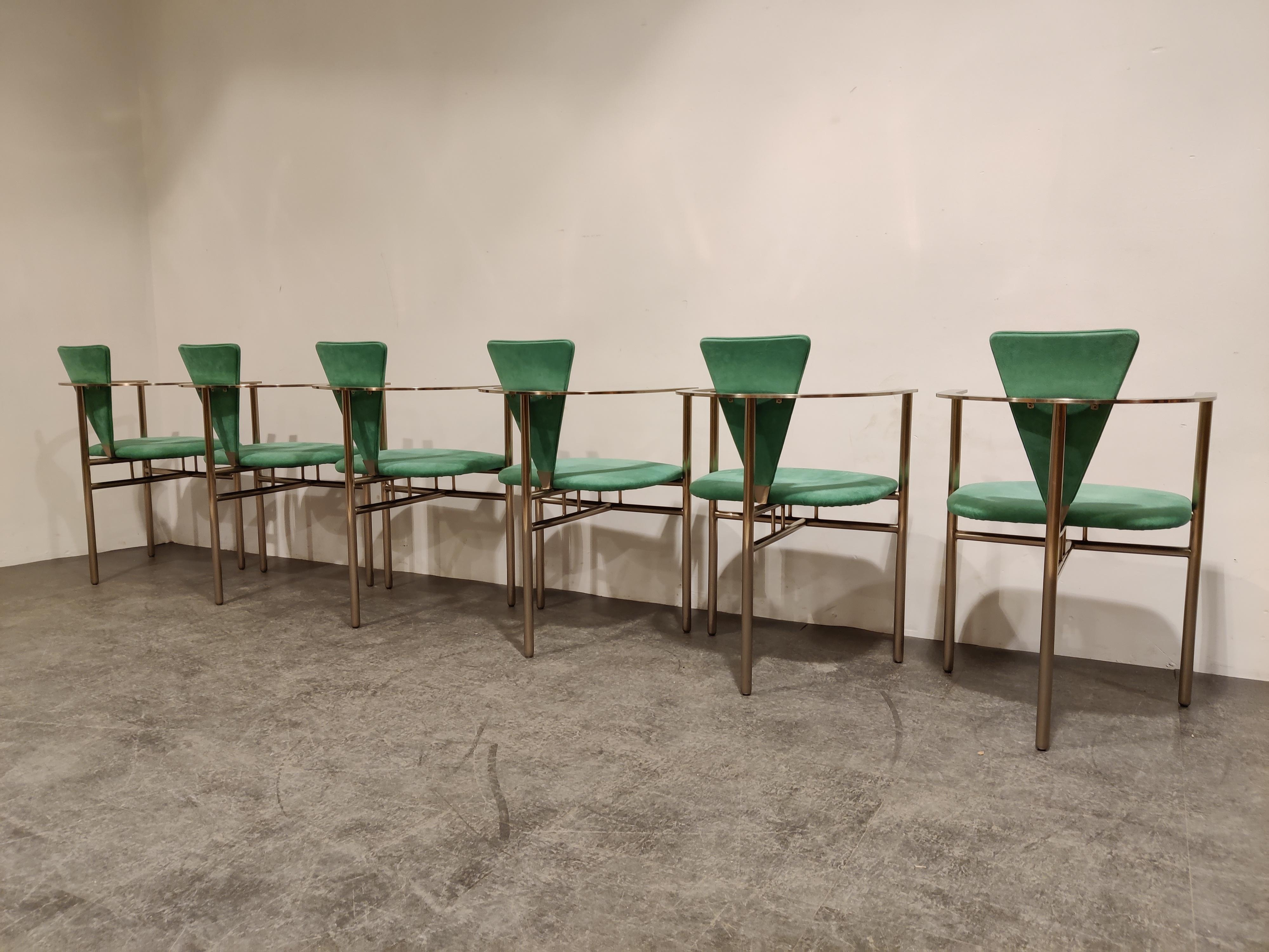 Set of six elegant dining room chairs manufactured by Belgochrom.

Nicely designed brushed steel tripod frames with elegant legs. Upholstered in green alcantara.

Belgochrom used to produce high end furniture and was the higher price-range