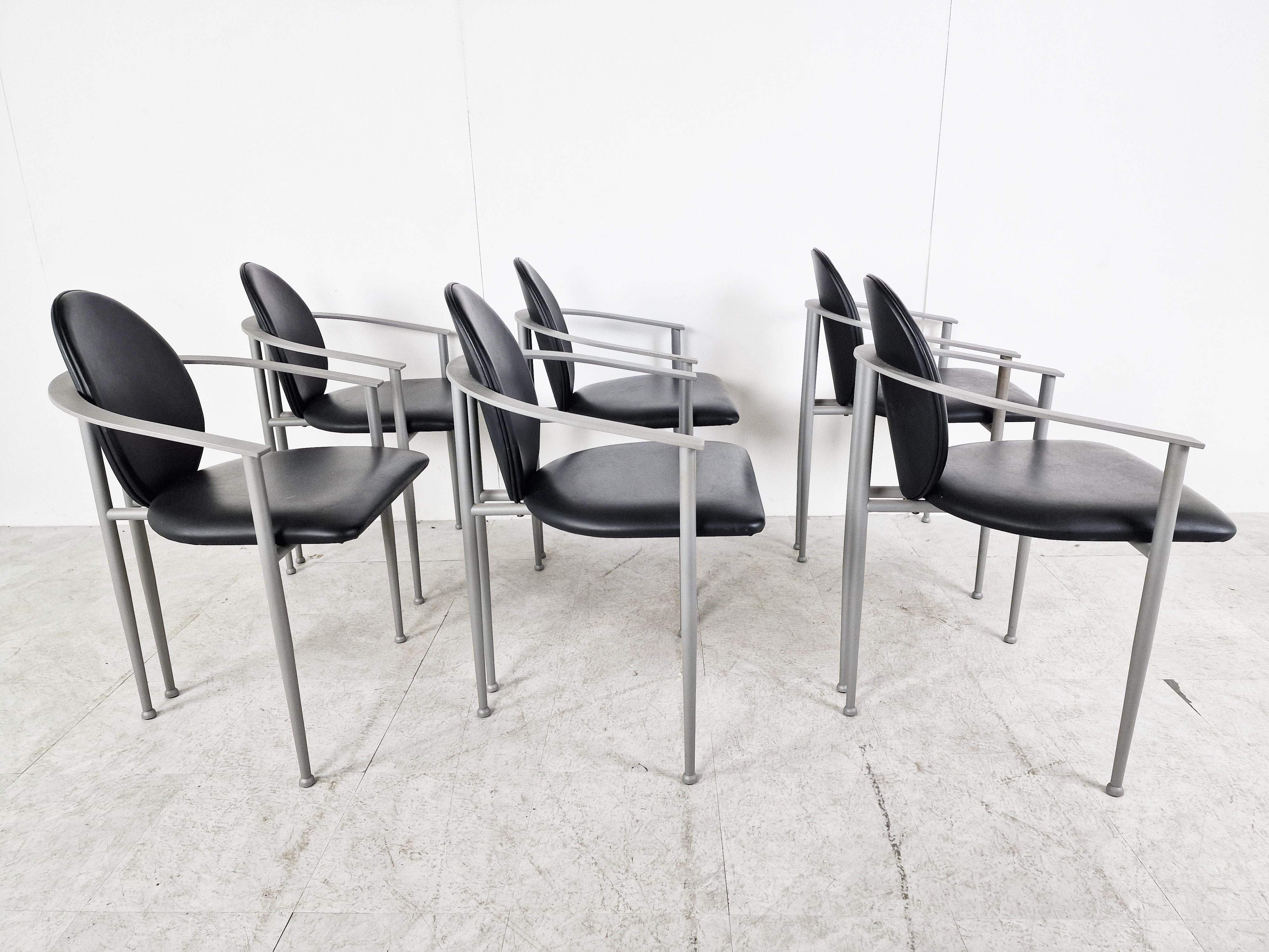 Set of six elegant dining room chairs manufactured by Belgochrom.

Nicely designed metal frames with elegant legs. Uphosltered in black leather with powdercoated frames.

Belgochrom used to produce high end furniture and was the higher