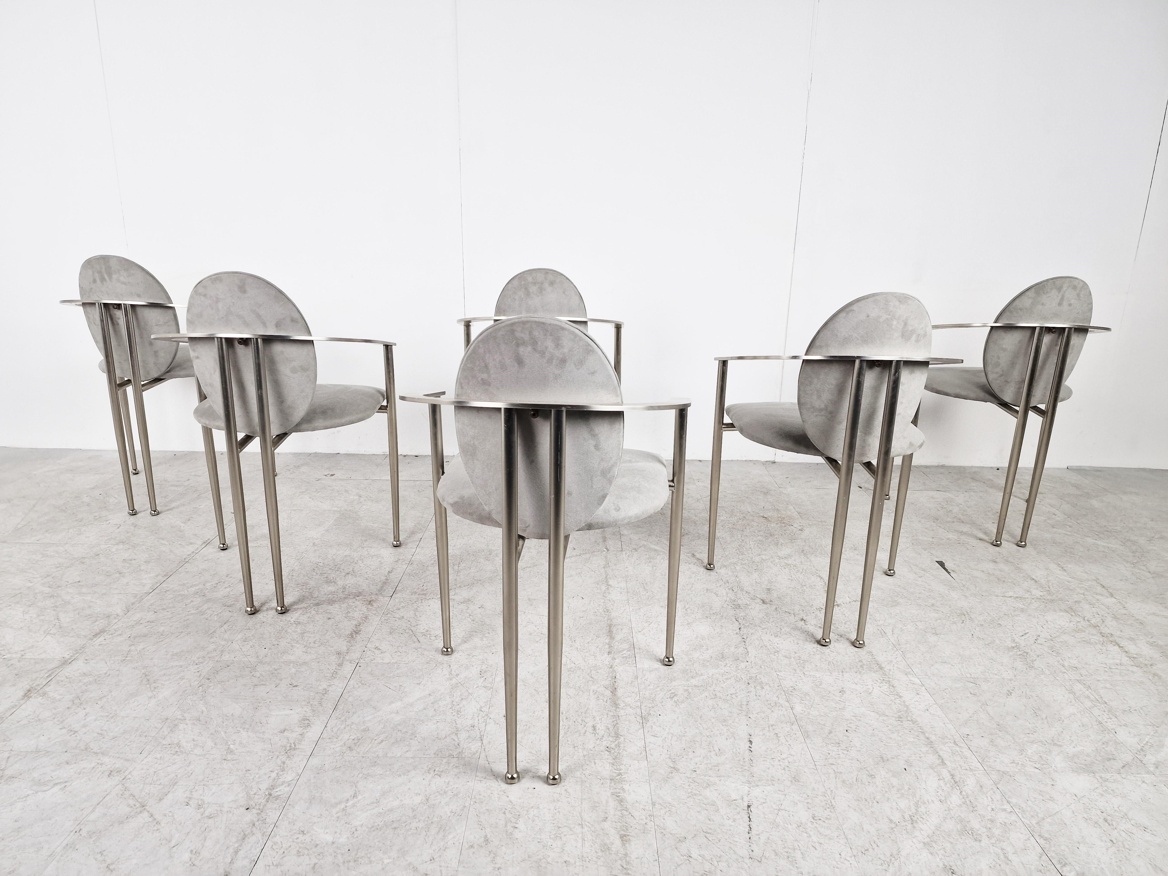 Set of six elegant dining room chairs manufactured by Belgochrom.

Nicely designed metal frames with elegant legs. Uphosltered in grey alcantara with chromed frames.

Belgochrom used to produce high end furniture and was the higher price-range