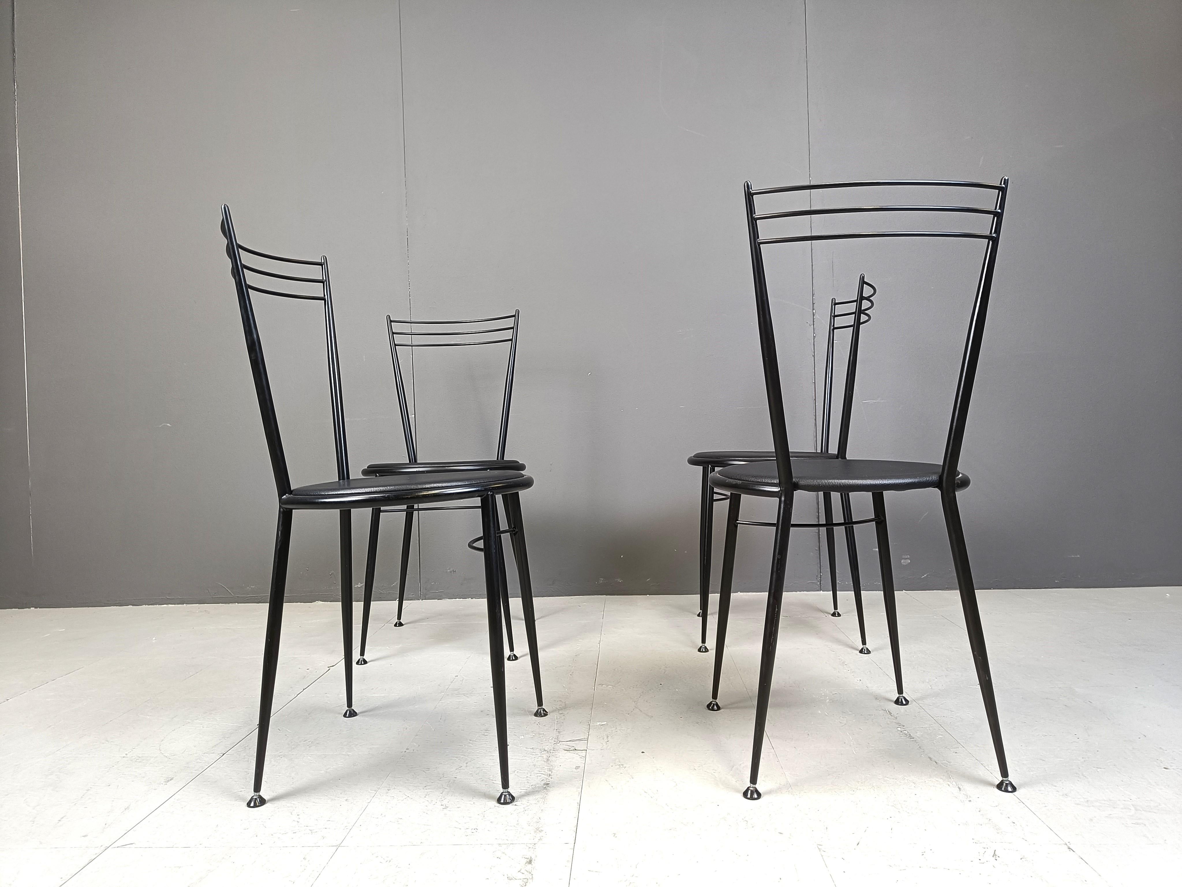 Vintage black metal dining chairs by Calligaris wit black leatherette dining chairs.

1980s - Italy

Very good condition

Dimensions
height: 87cm
Width: 40cm
Depth: 40cm
Seat height: 45cm

Ref.: 24102202

*Price is for the set
*Images are part of