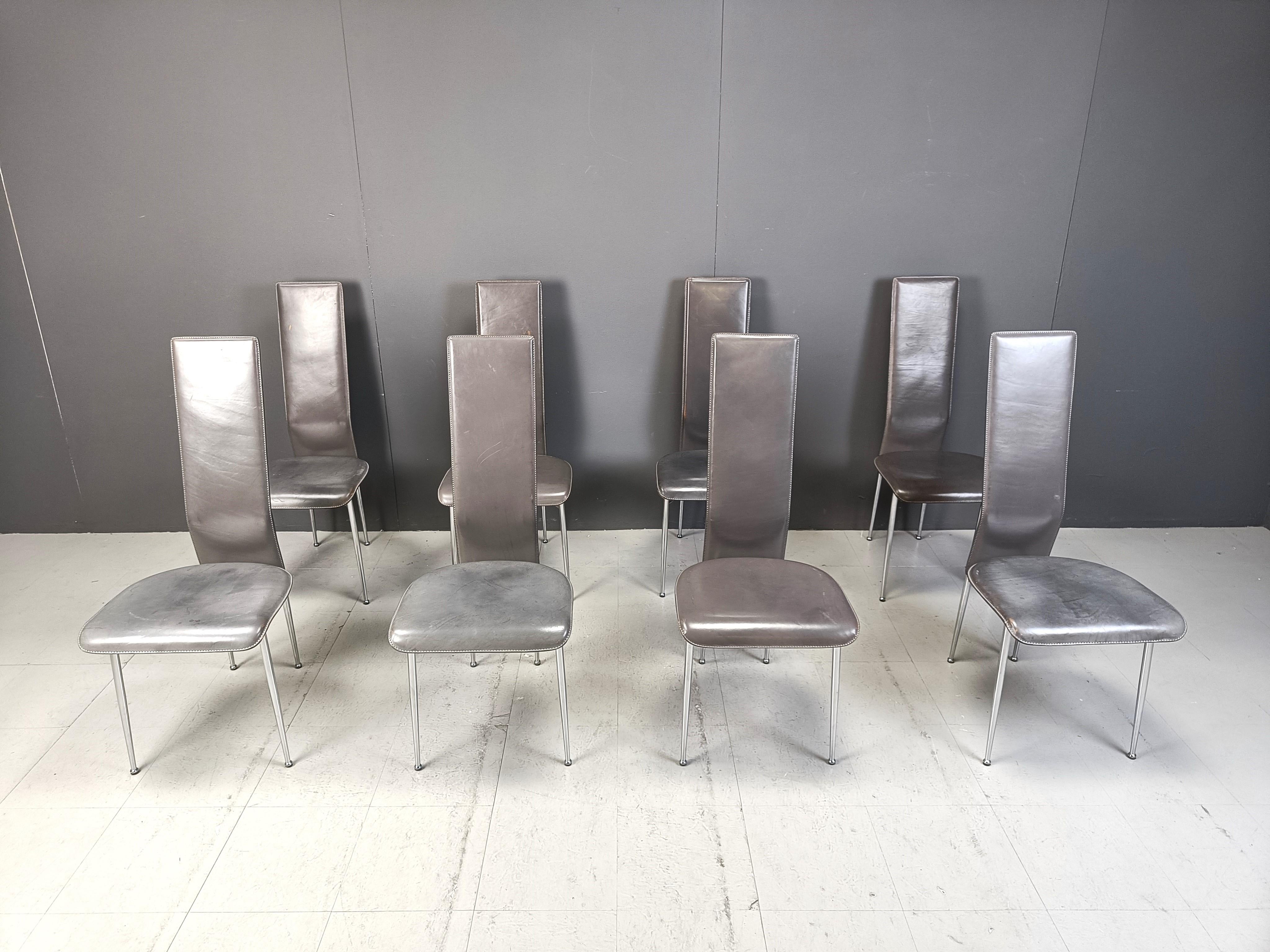 Set of 8 dark grey leather and chromed frame dining chairs designed by Giancarlo Vegni for Fasem italy.

The chair seat well, are beautifully designed and made from quality materials.

Notice the beautiful legs.

The chairs are in very good
