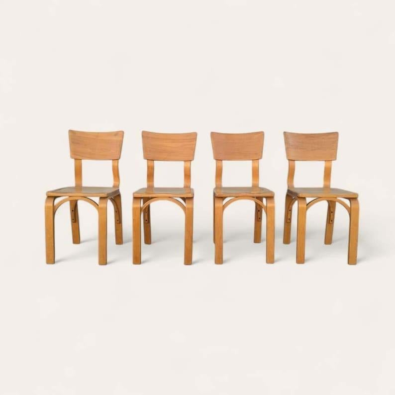 XX secolo Sedie da pranzo vintage di Thonet, sedile a sella di faggio in vendita