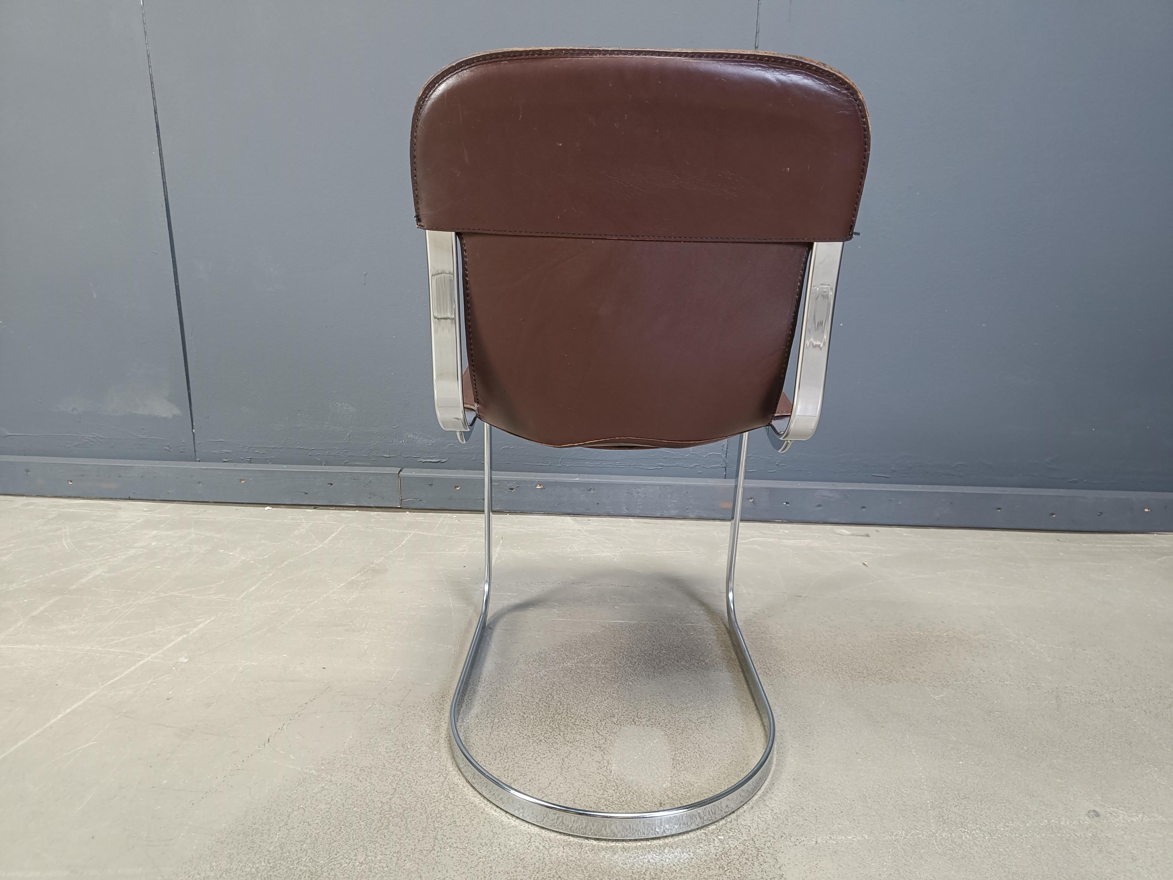 Set of 6 dining chairs designed by Willy Rizzo for Cidue.

The chairs have a beautifully shaped chrome frame and come with the original brown leather seats.

Good vintage condition

The chairs still look up to date in modern day interiors and seat