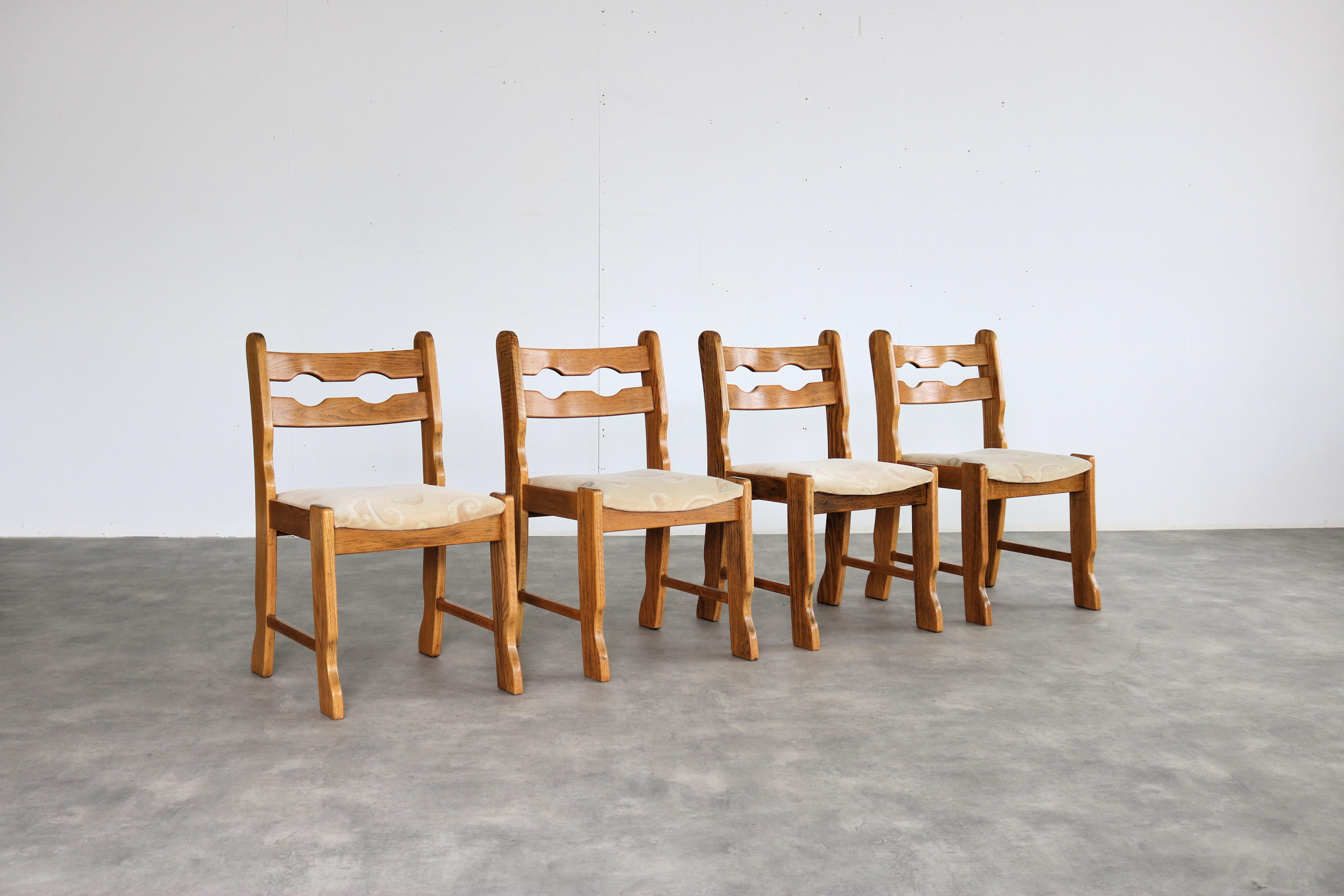vintage dining chairs  chairs  brutalist  1960s

period  1960s
design  unknown
condition  good  minor signs of use
size  84 x 47 x 50 (hxbxd) seat height 46 cm;

details  oak; upholstery; set of 4;

item number  2776