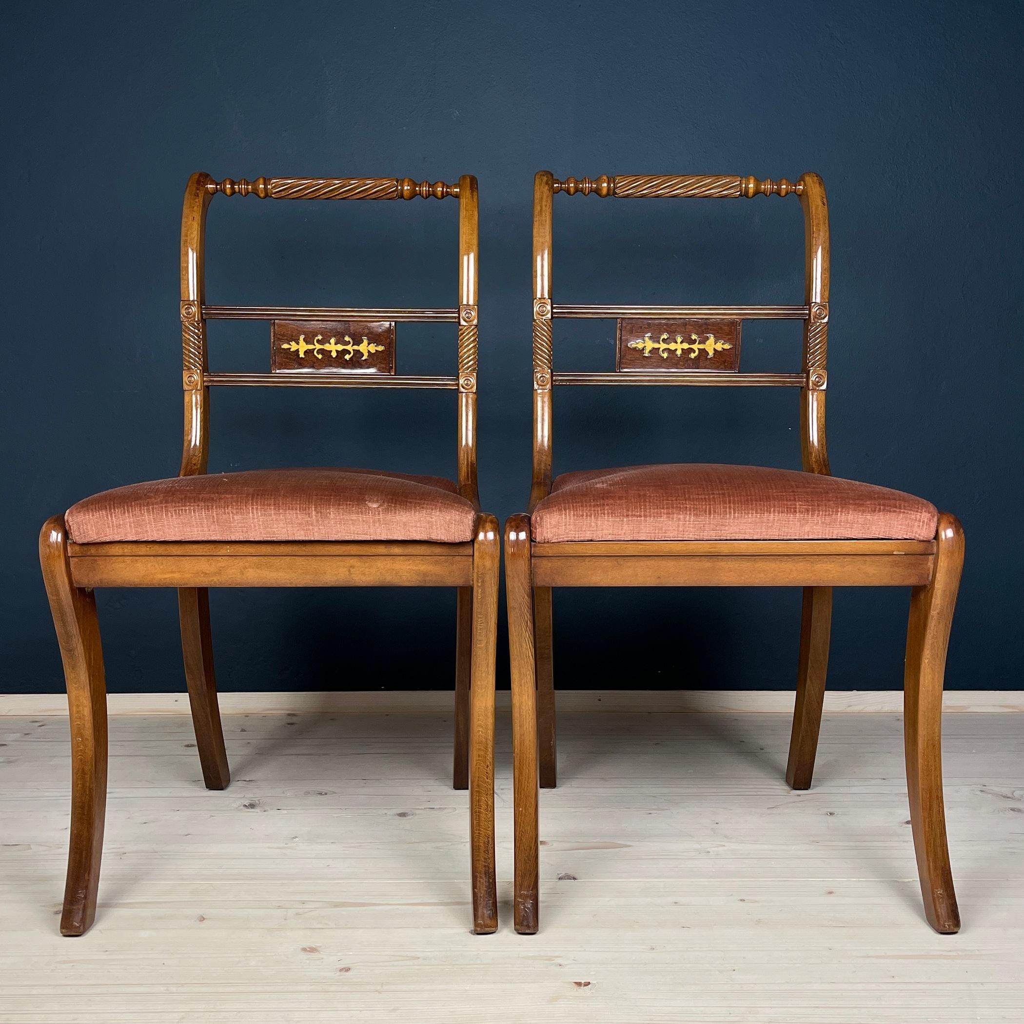 Introducing this charming pair of chairs, crafted in Italy during the 1960s. Despite the passage of time, these chairs have been impeccably preserved, showcasing their enduring beauty and quality craftsmanship. The original fabric. Adorned with