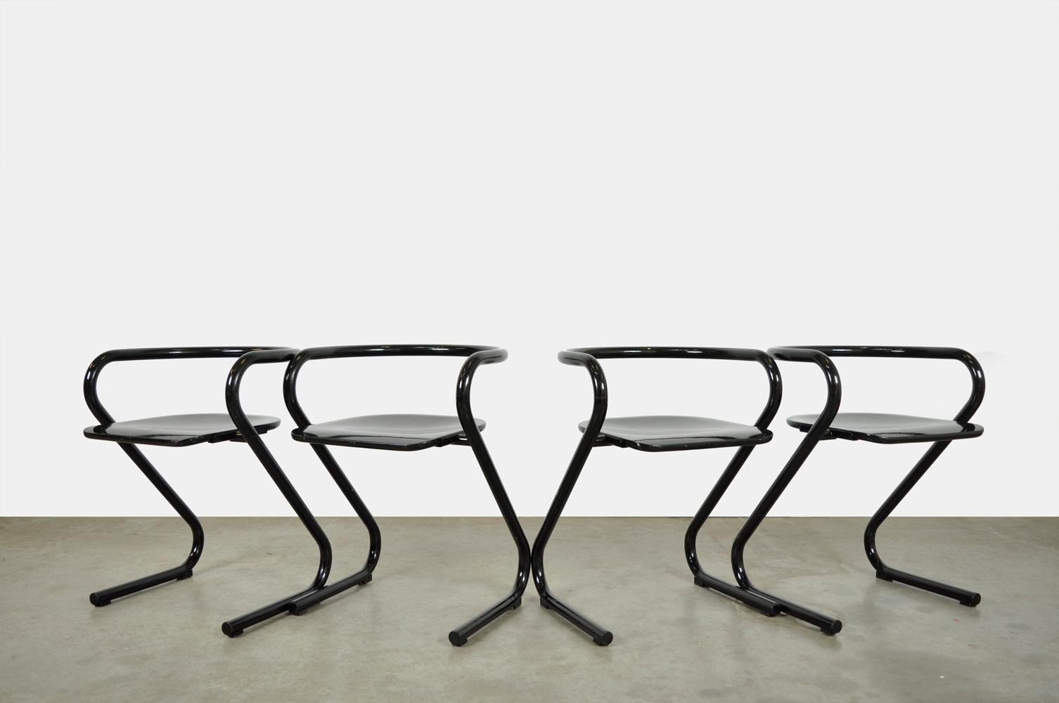 Set of 4 special dining chairs / table stools type S 70 by the Swedish design duo Börge Lindau & Bo Lindekrantz, produced by Lammhults, 1970s.

The stools have a black coated one-piece tubular steel frame and black wooden seats.