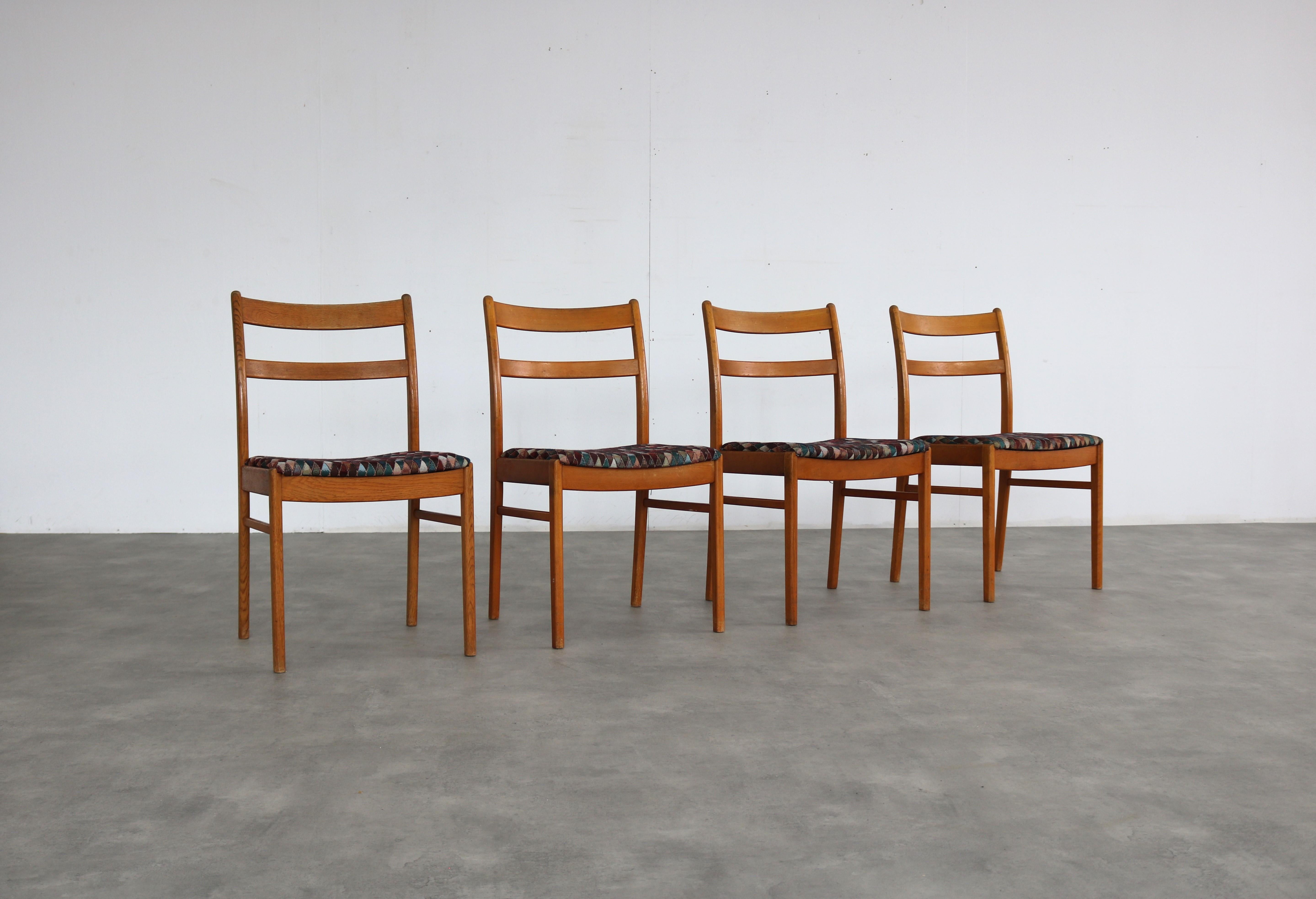 vintage dining room chairs  chairs  60s  Sweden

period  60's
design  unknown  Sweden
condition  good  light signs of use
size  81 x 45 x 50 (hxwxd) seat height 44;

details  oak; upholstery; set of 4;

article number  2305