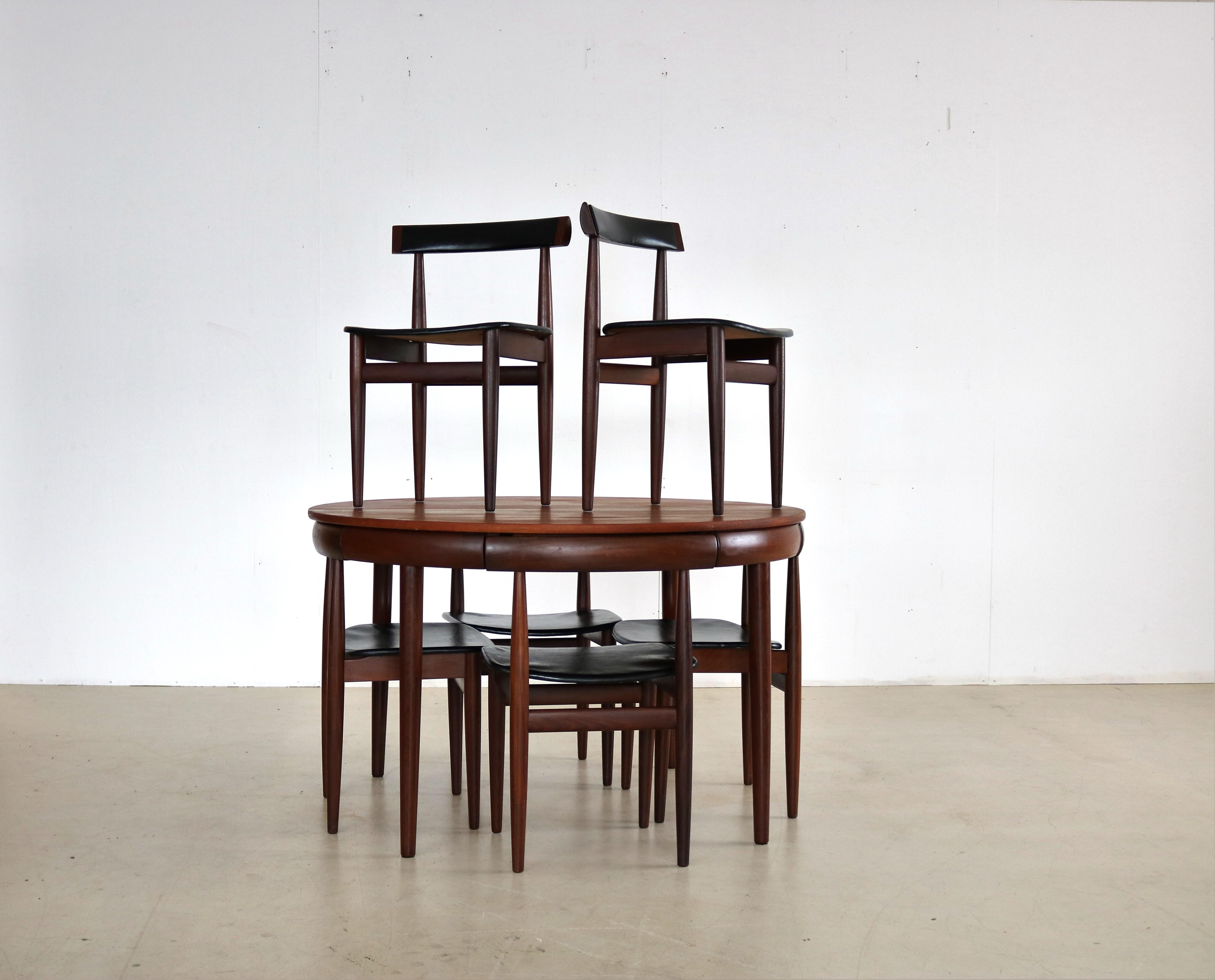 Vintage-Esszimmergarnitur  Tabelle  Stühle  Fremde Rojle  Dänisches Design

Klassische Esszimmereinrichtung aus den 1960er Jahren, entworfen von Hans Olsen für Frem Rojle. Elegantes Design, bei dem die Stühle 