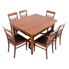 Ensemble de salle à manger vintage avec table et six chaises des années 1930. 