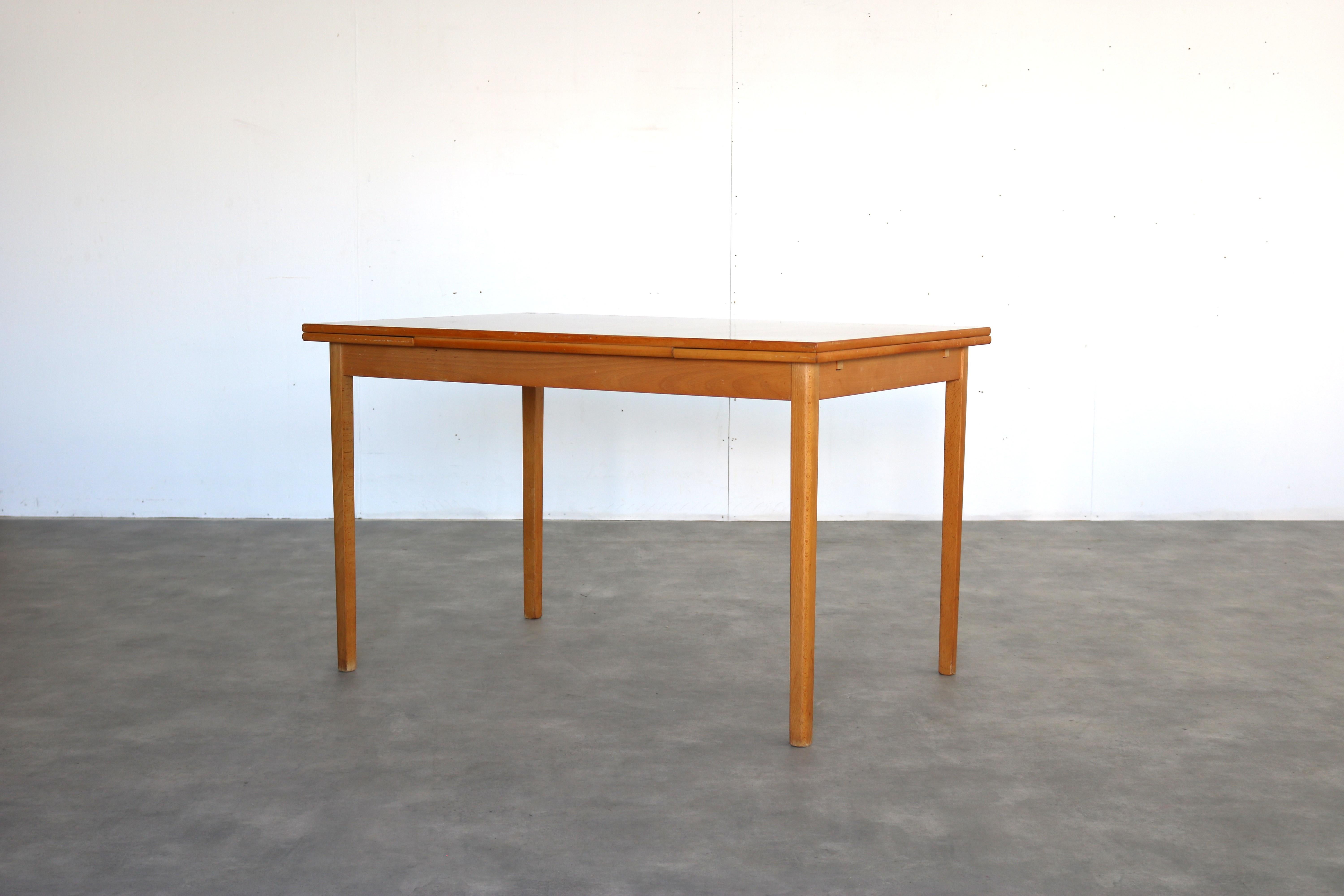Vintage dining table  table  1960s  extendable  Swedish

period  1960s
design  unknown  Sweden
condition  good  minor signs of wear
size  74 x 120 x 80 cm (H x W x D) + 2 extra 30 cm leaves;

details  teak;

item number  2899