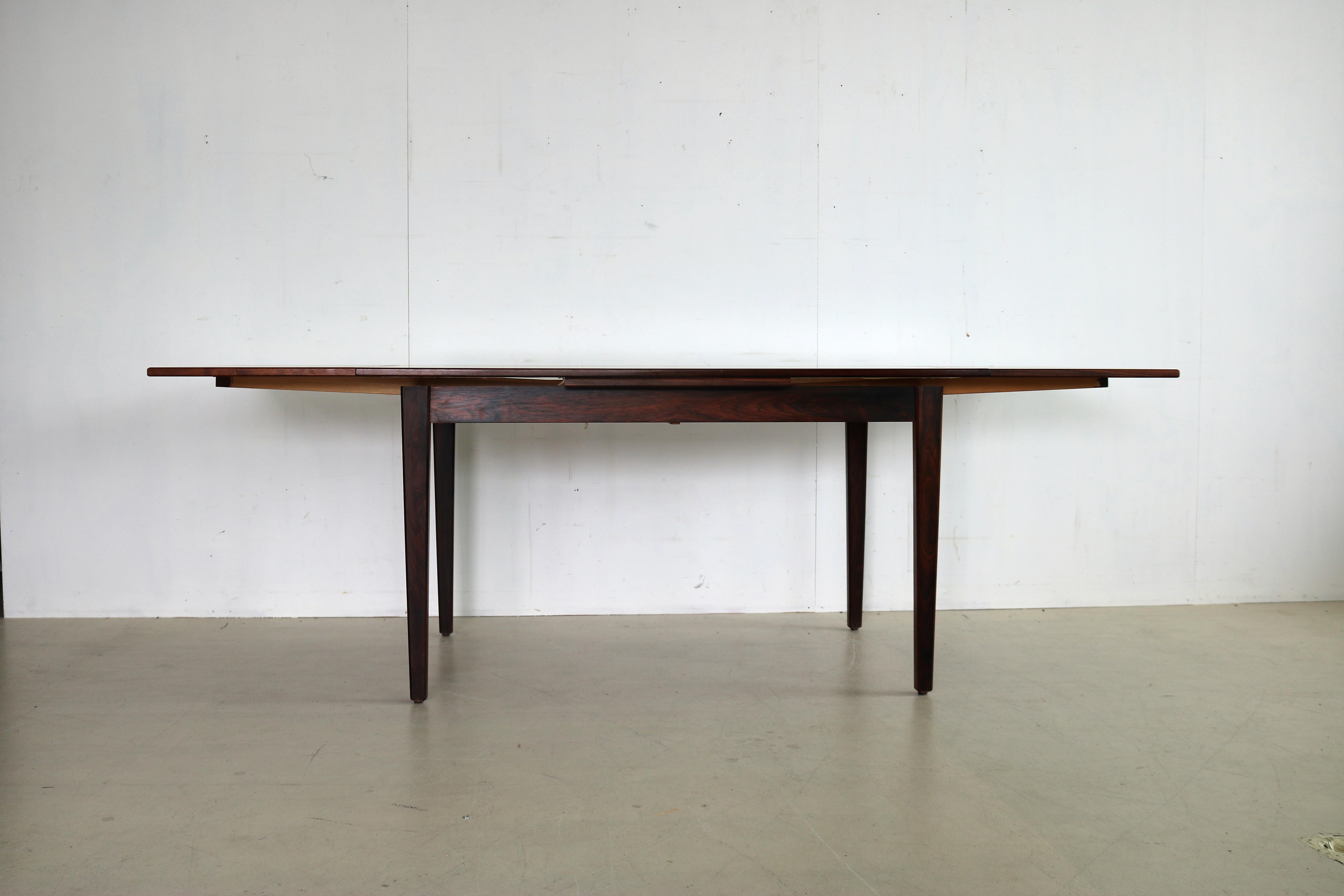 vintage dining table table 60s Denmark

period 60's
designs Sejling Skabe Denmark
conditions good light signs of use
size 75 x 138/227 x 87 (HxWxD)

details rosewood; 2 pull-out leaves;

article number 1635.