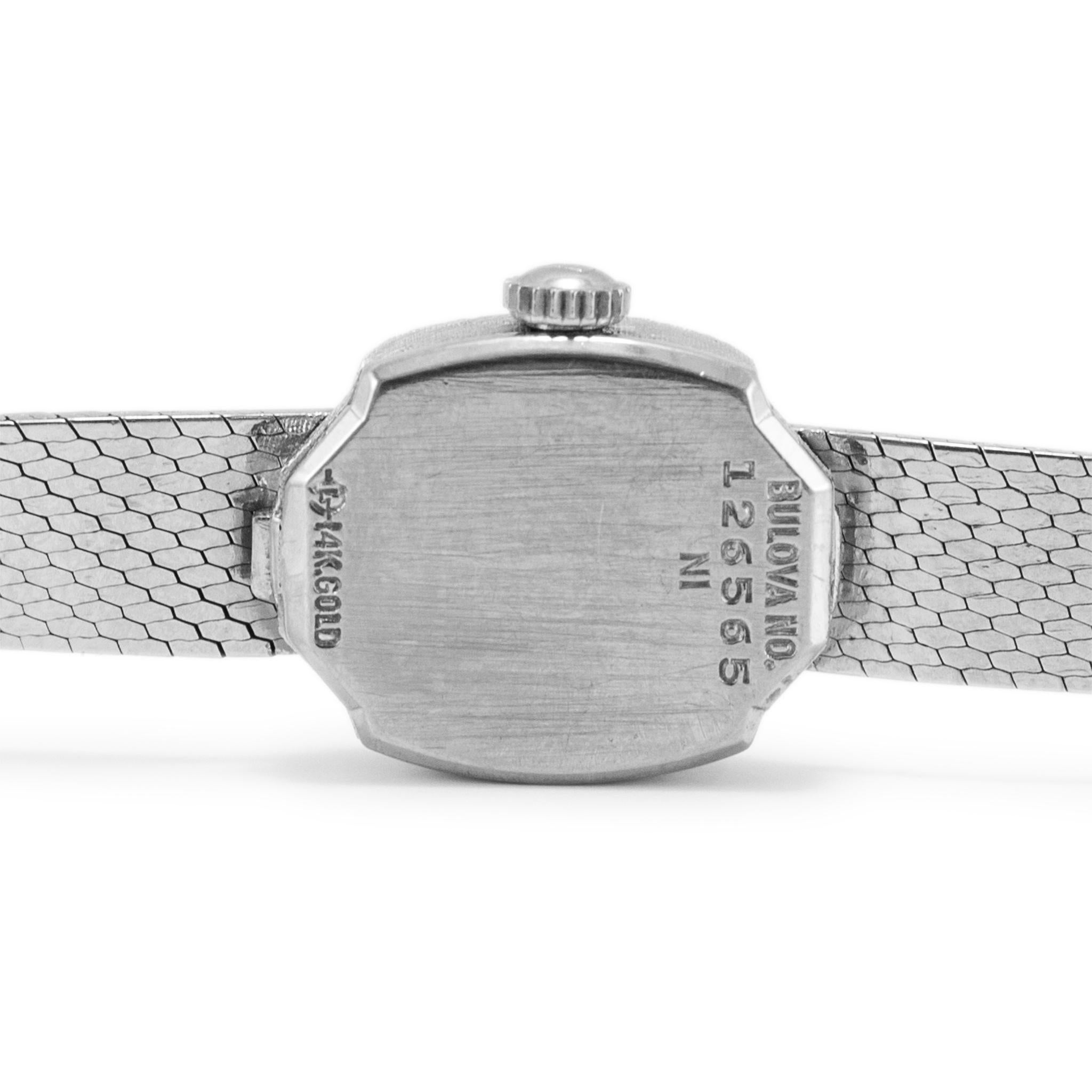 Vintage Dior Bulova 23 Blue Diamond Bezel Manual Winding 14K White Gold Watch In Excellent Condition For Sale In Houston, TX