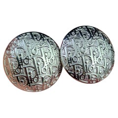 Vintage Dior logo script clip on earrings, silver tone metal