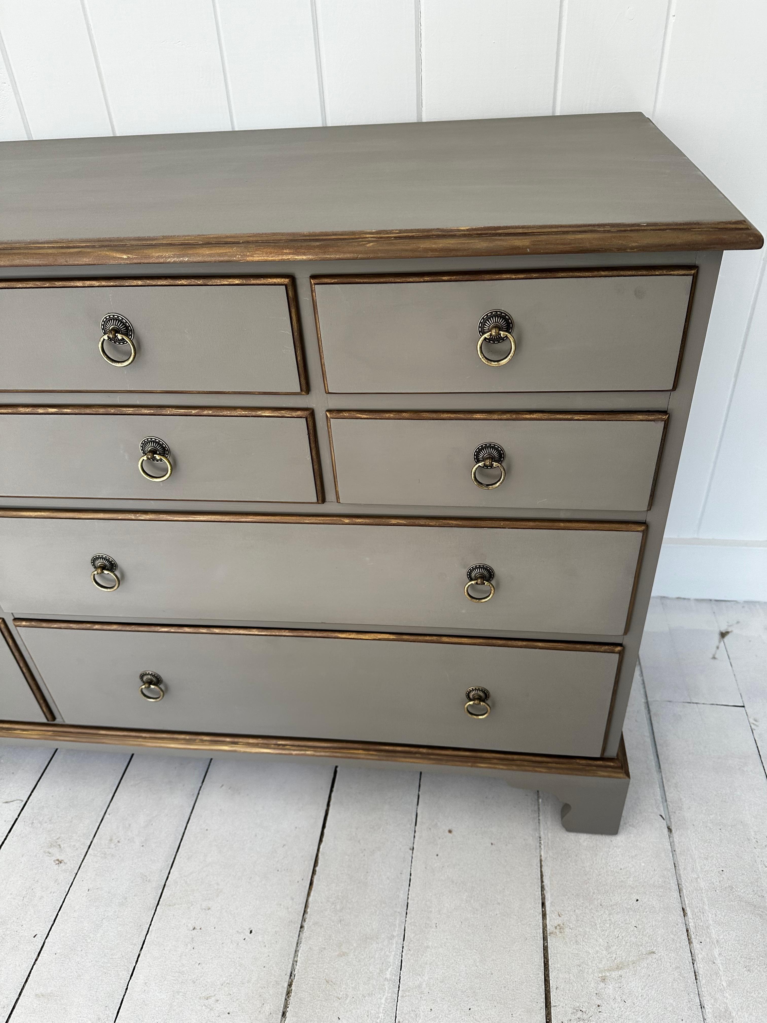 Refinished large paint decorated black cherry 10-drawer Directoire style dresser.  A handsome grey paint with a hint of gold gilt accent gives this dresser added style and functionality.