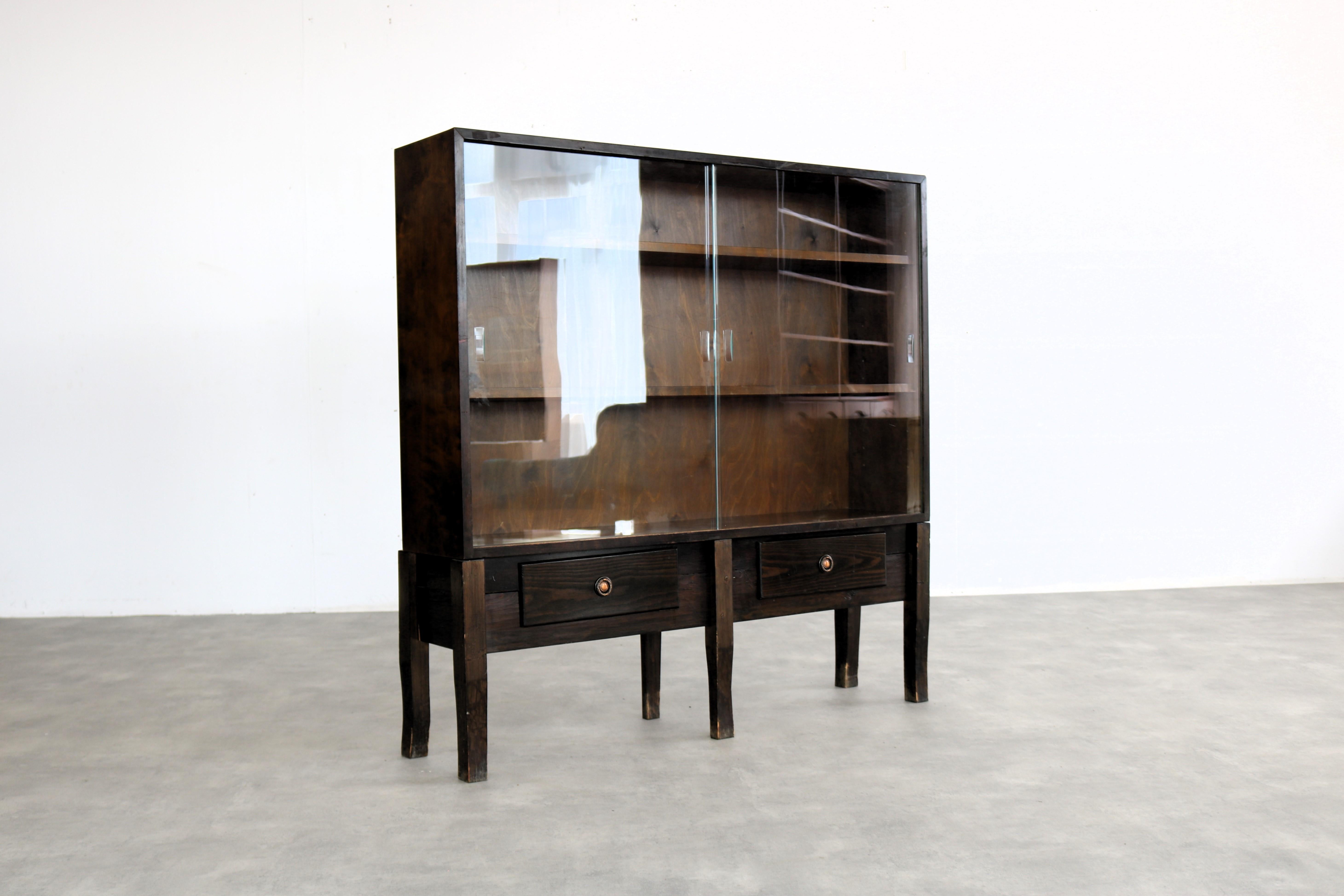 vintage display cabinet  sideboard  1950s  Swedish

period  1950s
design  unknown  Sweden
condition  good  light signs of wear/patina
size  130 x 130 x 28 (hxwxd)

details  wood; glass;

article number  2406