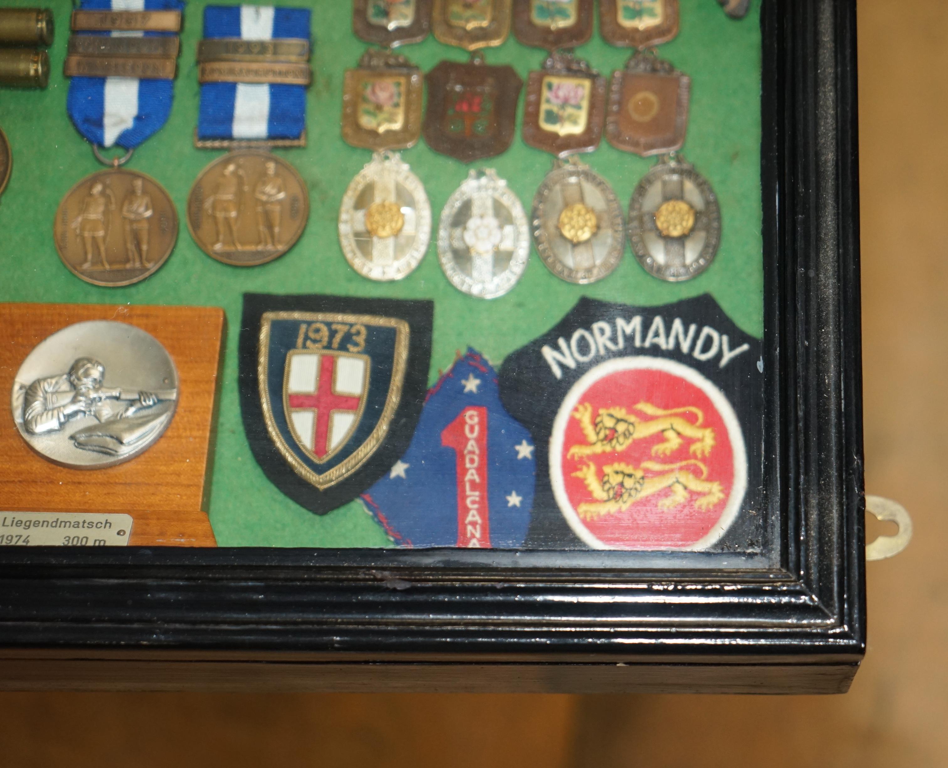 VINTAGE DISPLAY CASE FULL OF SHOOTiNG SNIPER MEDALS AND AWARDS MUST SEE PIECE For Sale 9