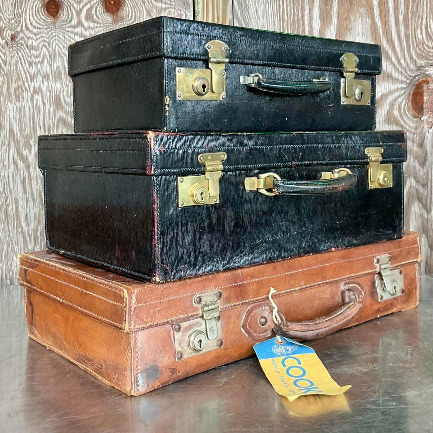 Bohemian Vintage Display Stack of Antique Leather Suitcases - Set of 3 For Sale