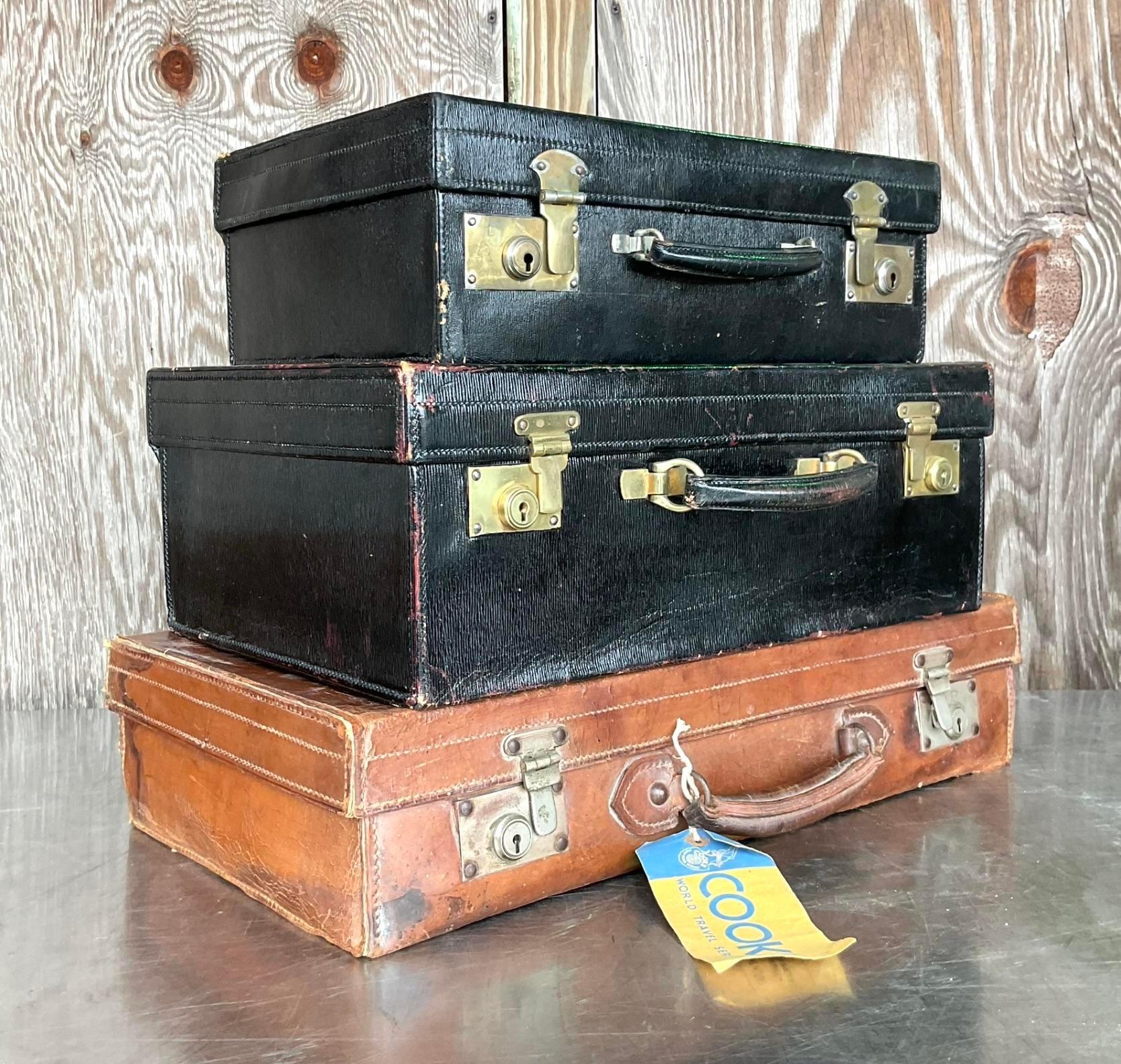 North American Vintage Display Stack of Antique Leather Suitcases - Set of 3 For Sale