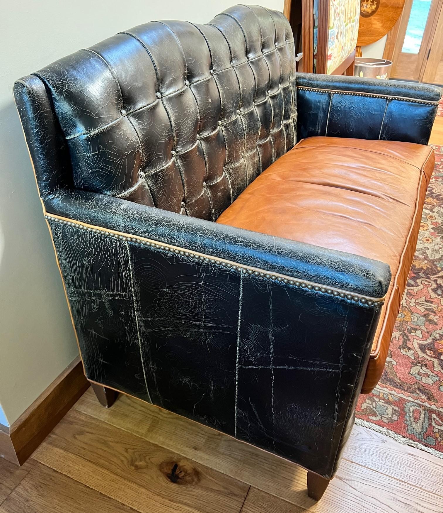 black distressed leather sofa
