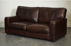 ViNTAGE DISTRESSED BROWN LEATHER TWO TO THREE SEATER SOFA