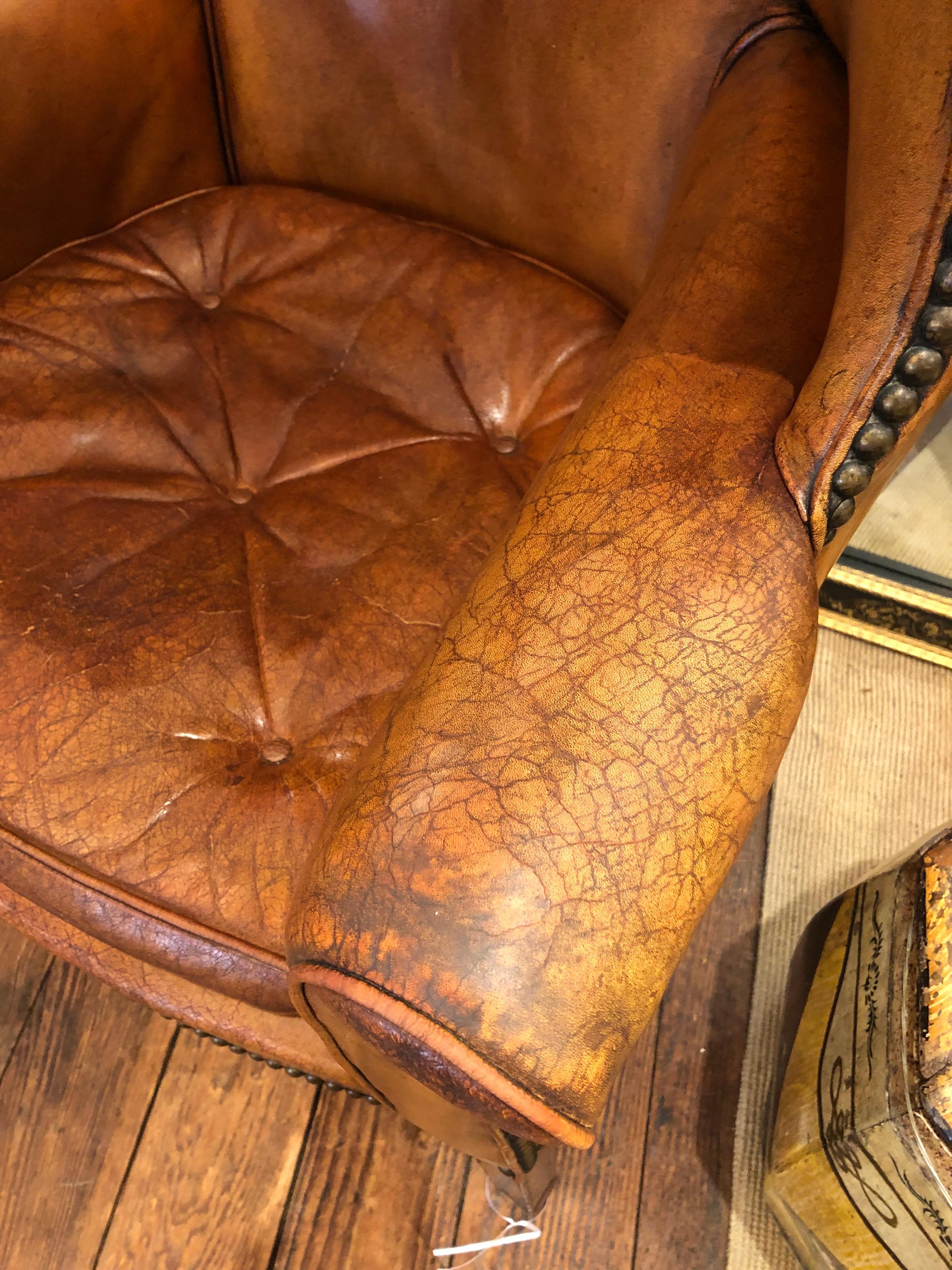 American Vintage Distressed Caramel Leather Barrel Back Wing Chair