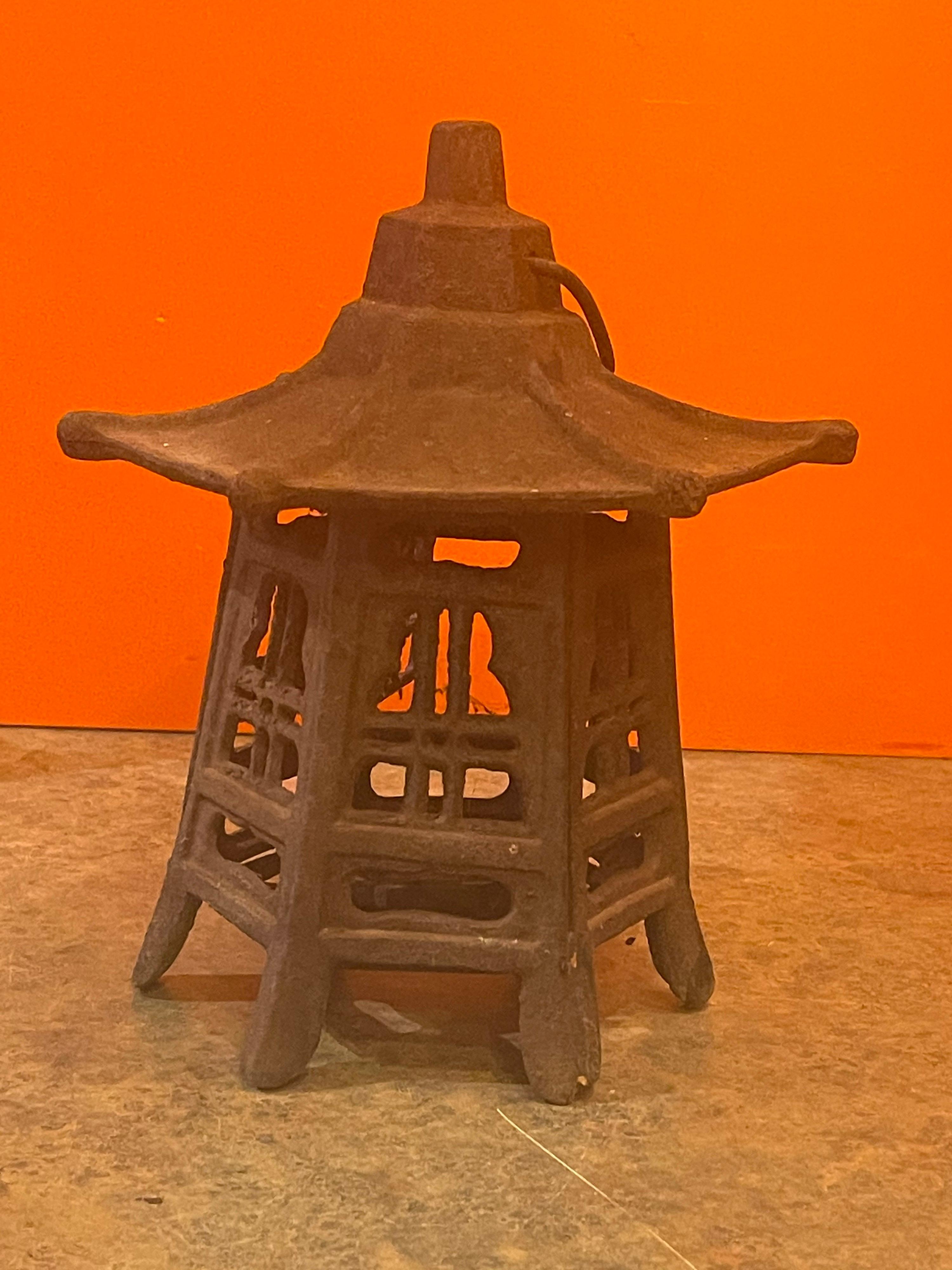 Vintage Distressed Cast Iron Japanese Pagoda Lantern In Good Condition For Sale In San Diego, CA