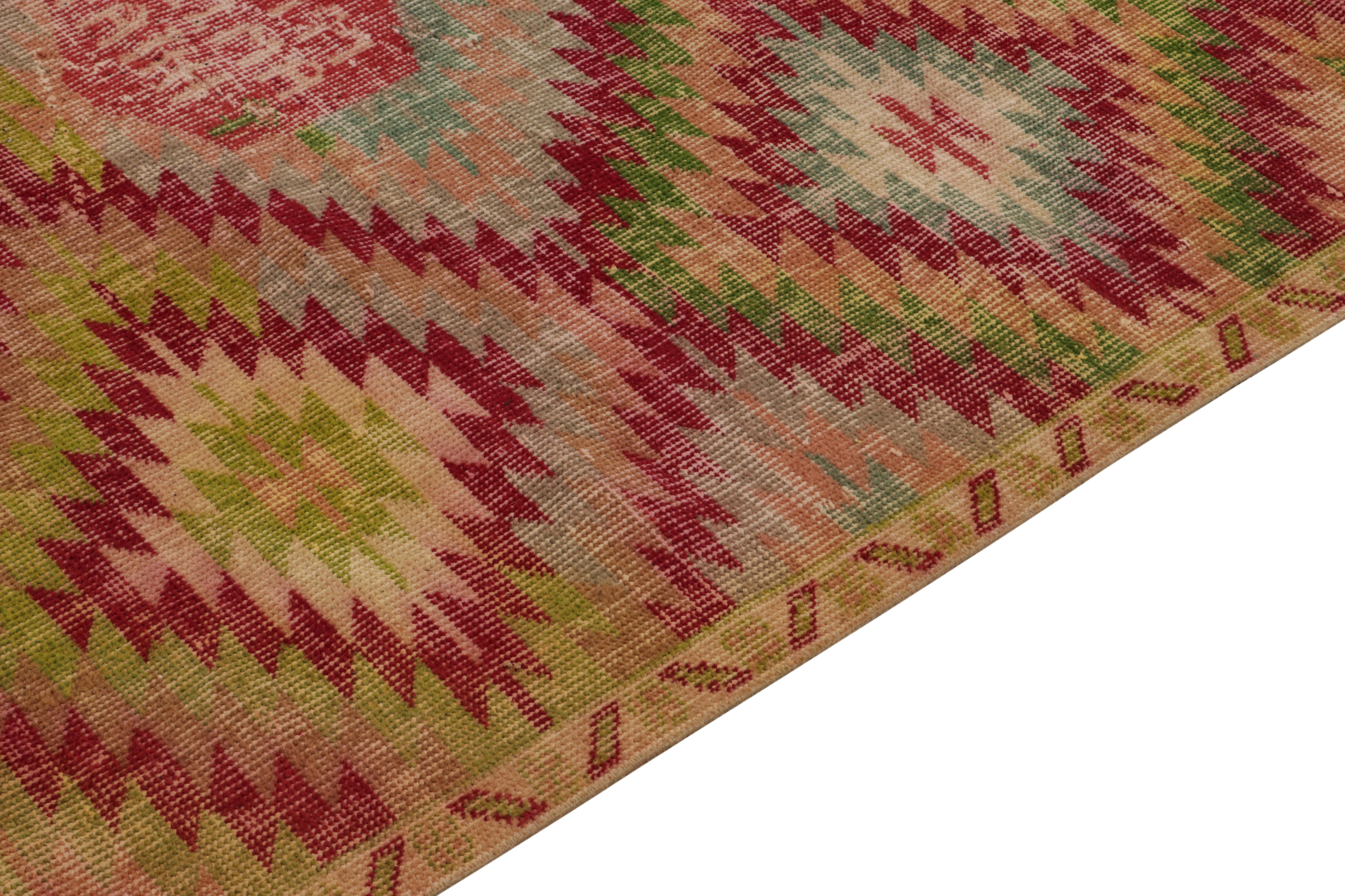Hand-Knotted Vintage Distressed Deco Rug in Red, Green, Pink Geometric Pattern by Rug & Kilim For Sale