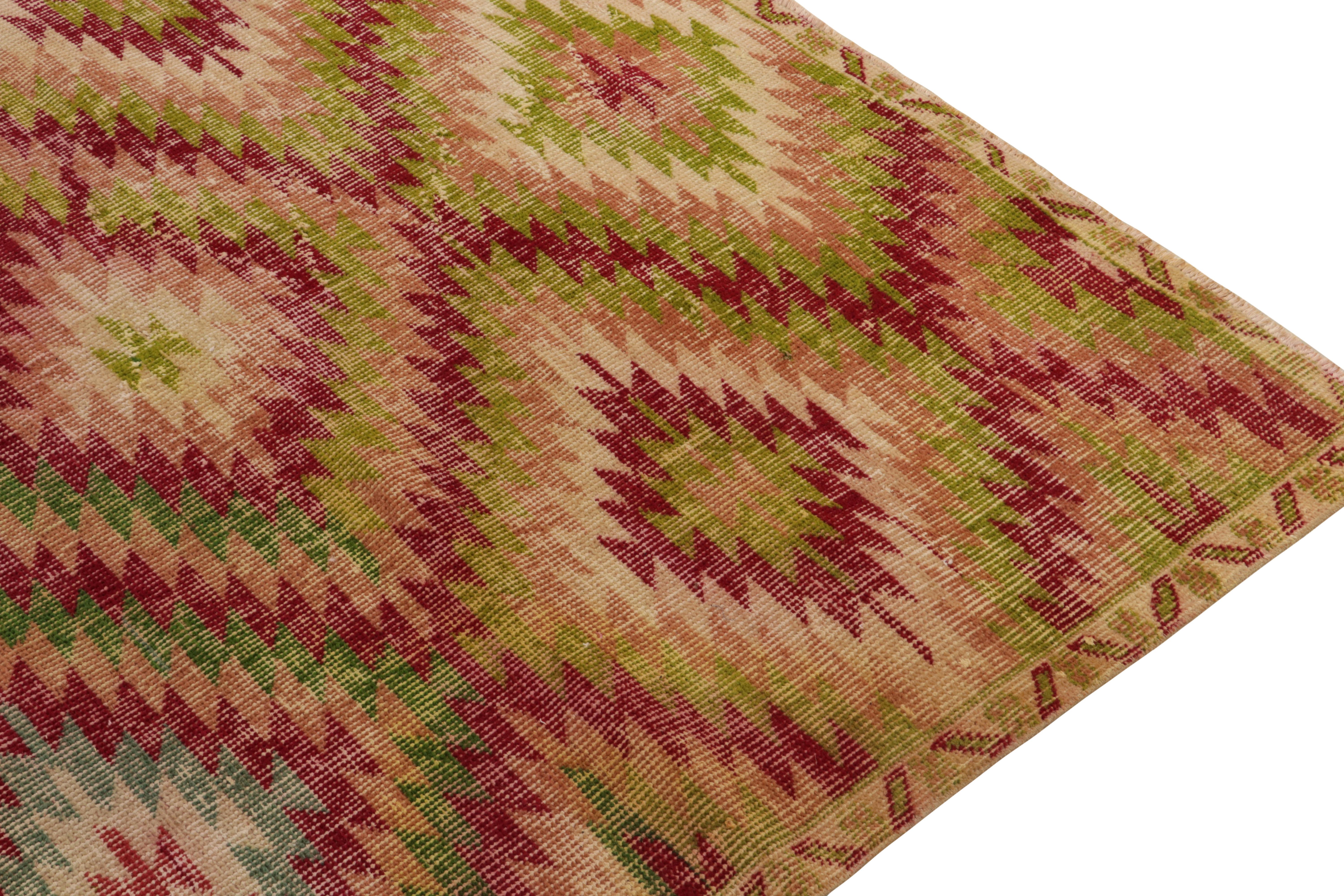Vintage Distressed Deco Rug in Red, Green, Pink Geometric Pattern by Rug & Kilim In Good Condition For Sale In Long Island City, NY