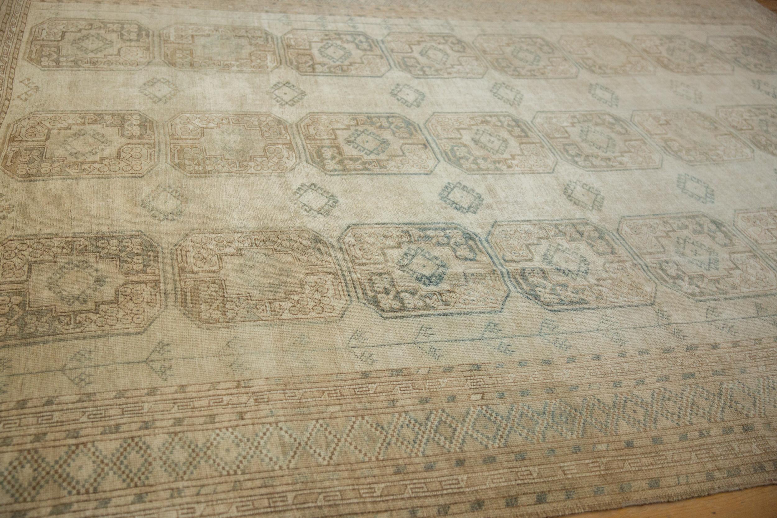 Hand-Knotted Vintage Distressed Ersari Carpet For Sale