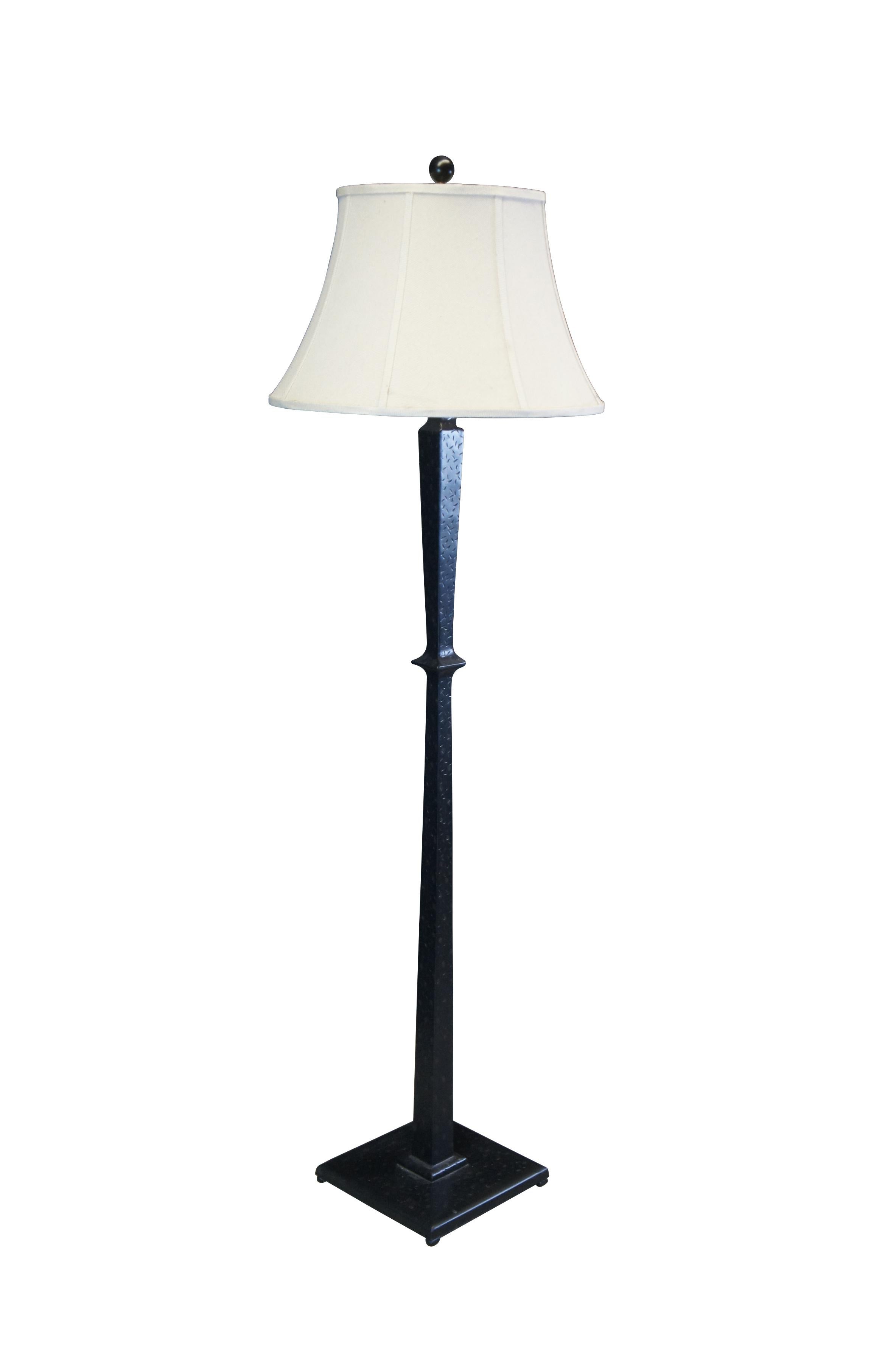 Distressed iron floor lamp.  Features a square center and base with tapered shade.

Dimensions:
66