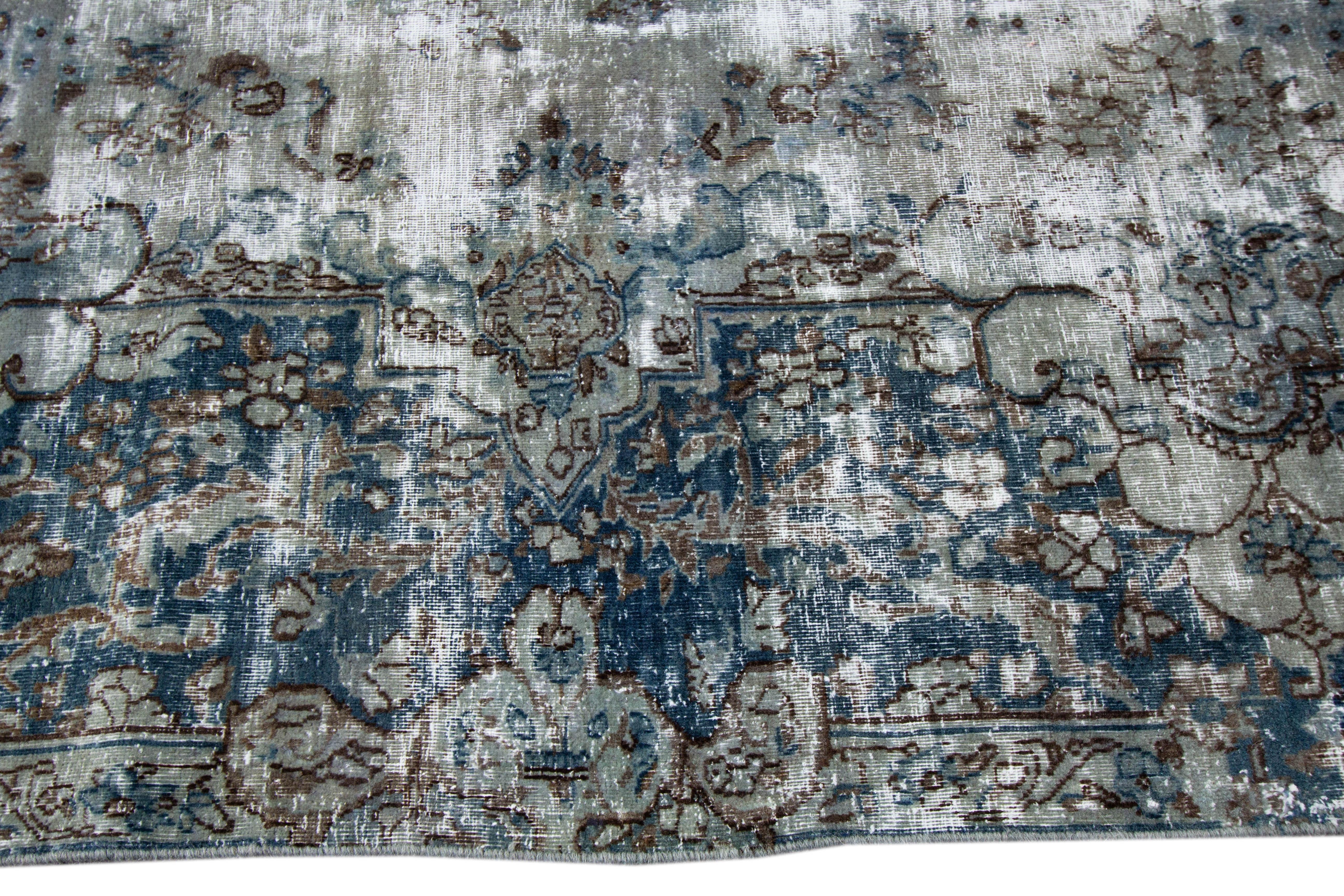20th Century Vintage Distressed Hand-Knotted Wool Rug For Sale