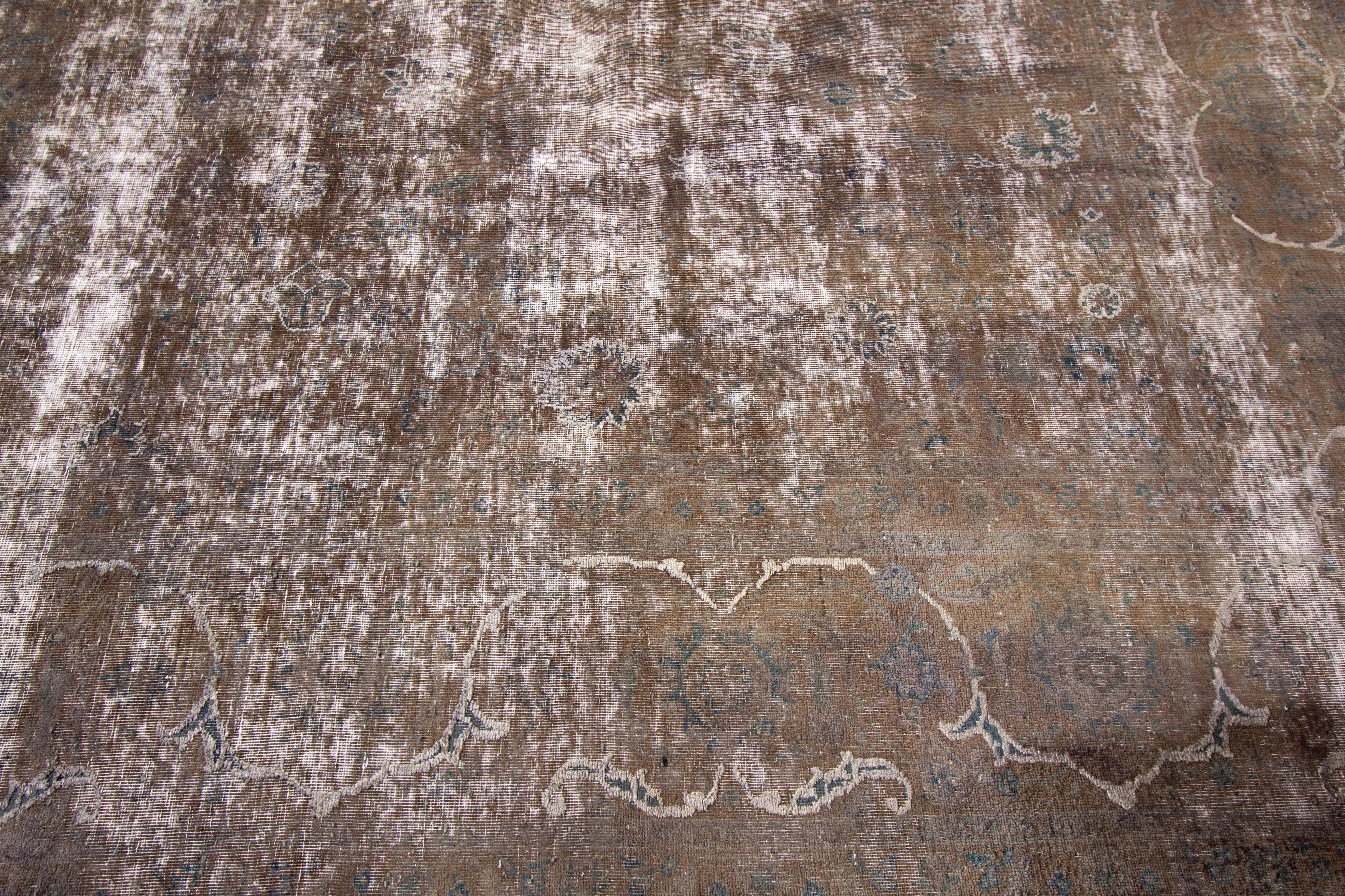 20th Century Vintage Distressed Hand Knotted Wool Rug For Sale