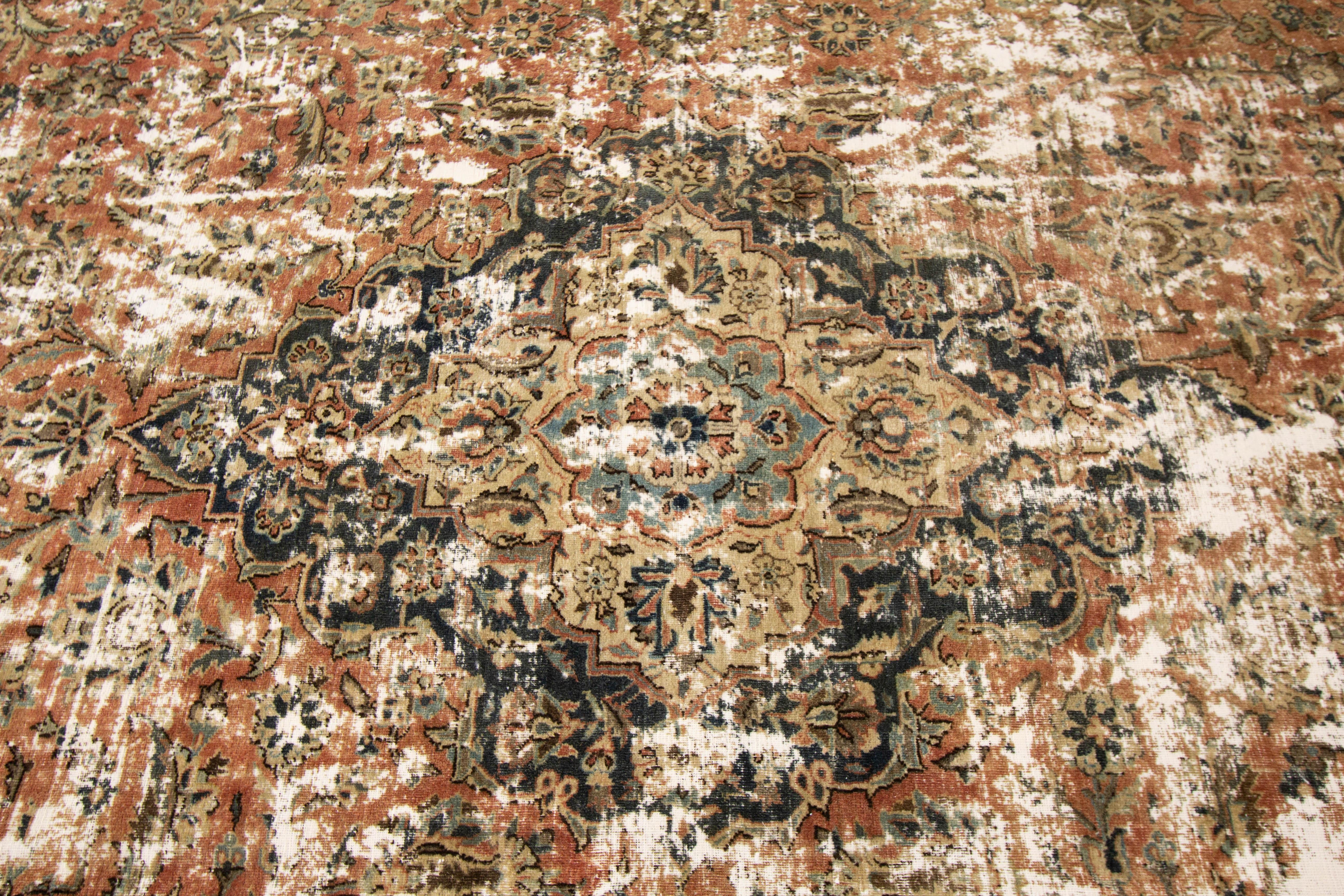 20th Century Vintage Distressed Hand Knotted Wool Rug For Sale