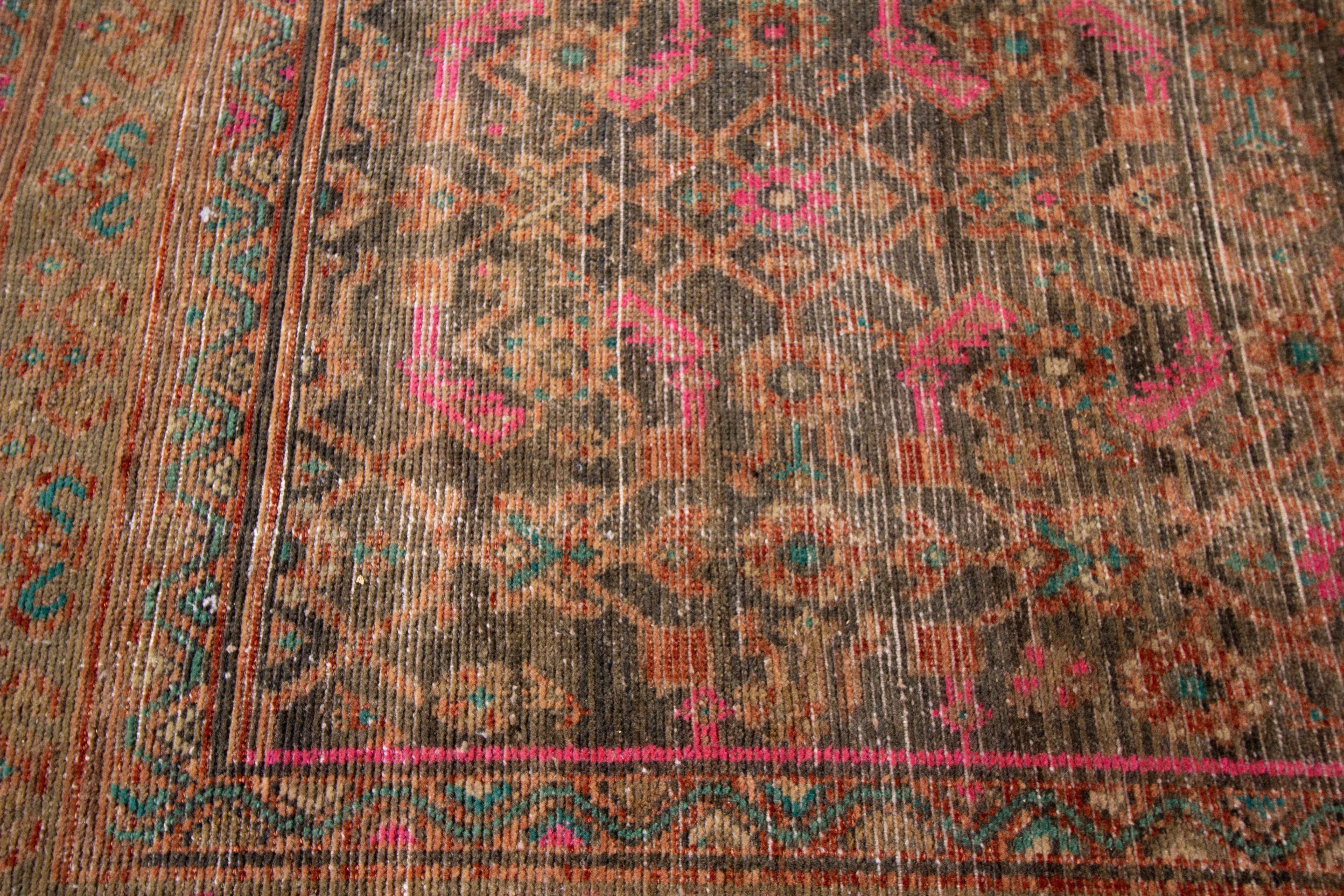 Hand-Knotted Vintage Distressed Hand Knotted Wool Runner Rug For Sale