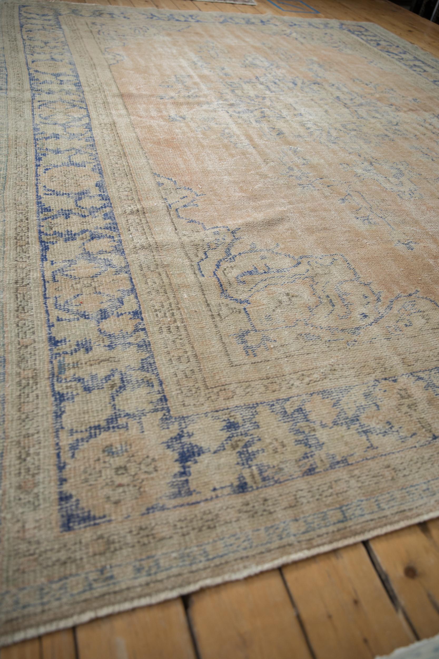 Mid-20th Century Vintage Distressed Oushak Carpet