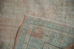 Alfombra Oushak vintage desgastada