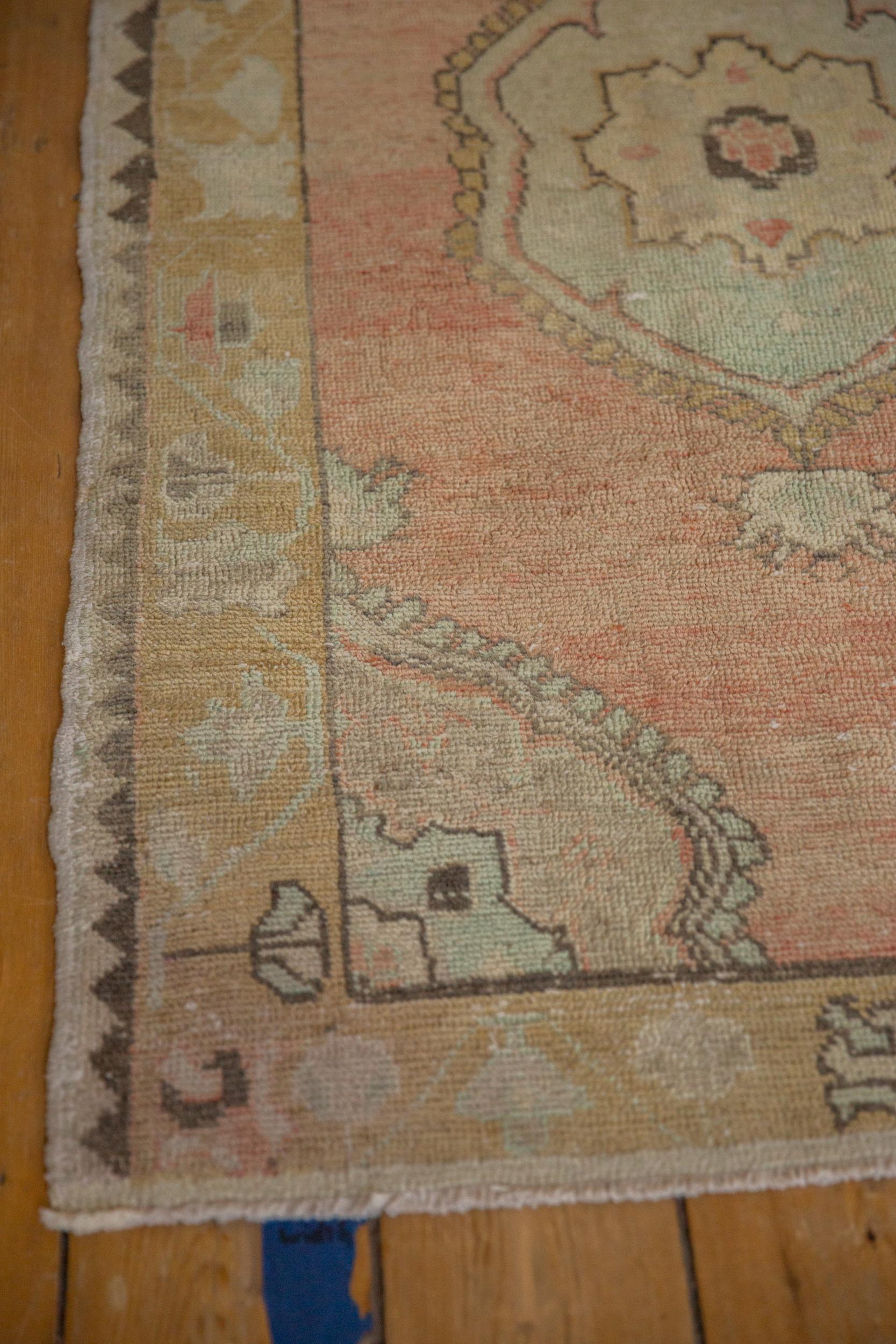 Mid-20th Century Vintage Distressed Oushak Rug For Sale