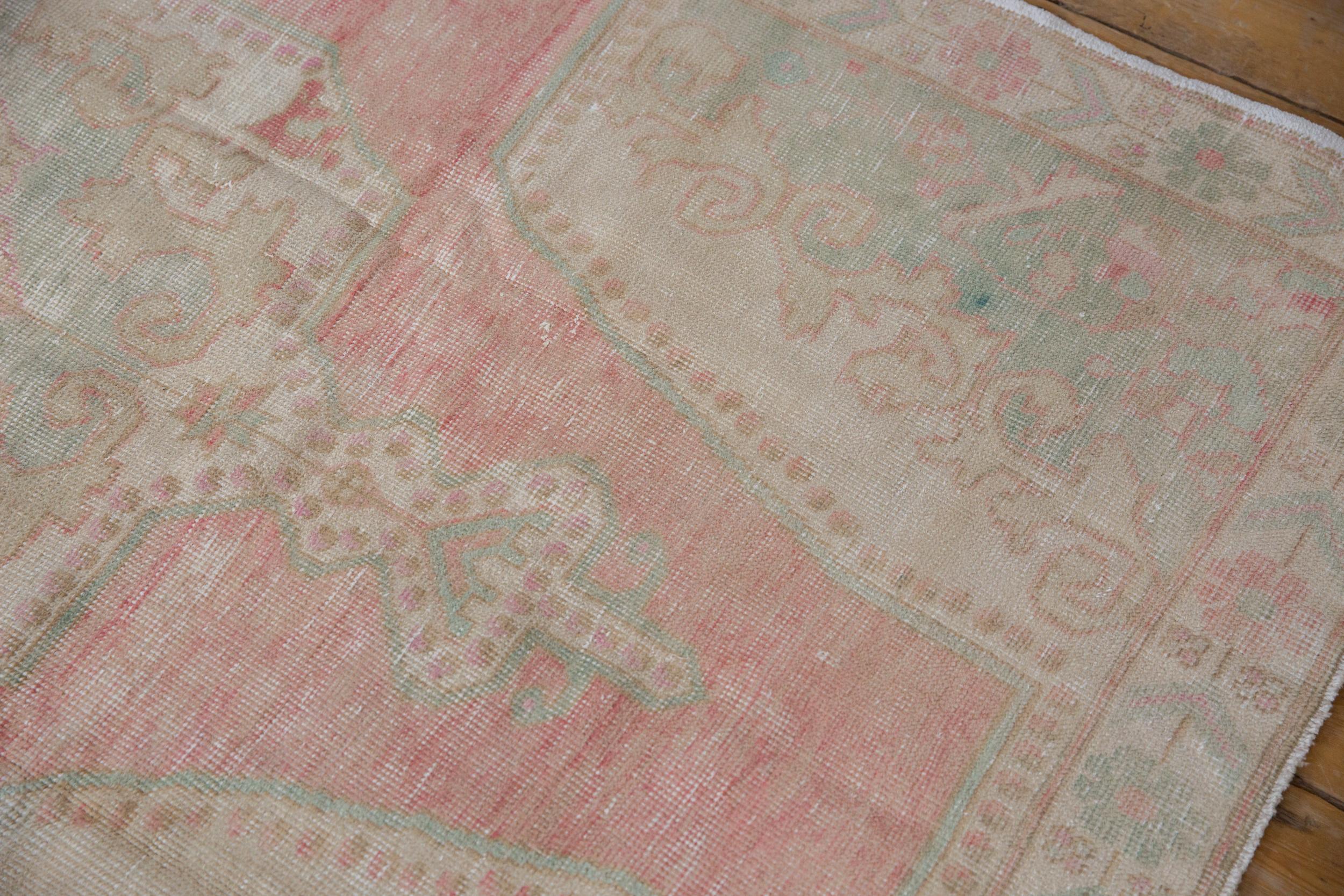 :: Oversize center medallion with trefoil contoured finials atop an abrashed ground and corner spandrel overlays in Rococo stylized fills with pearl perimeter. Colors and shades include: Pink, dusty pale red, sea foam ocean green, ivory, sand and