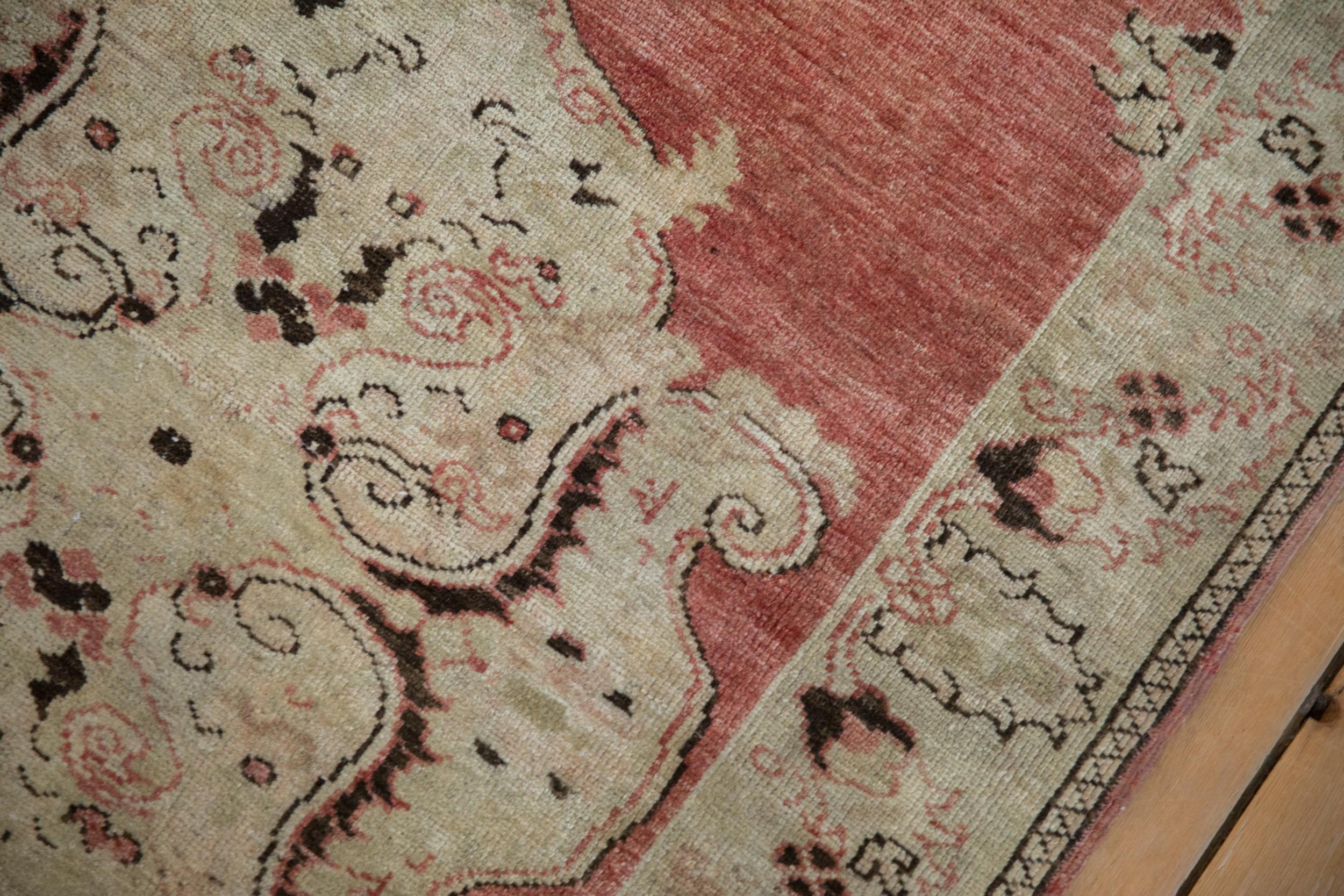Mid-20th Century Vintage Distressed Oushak Rug Runner For Sale