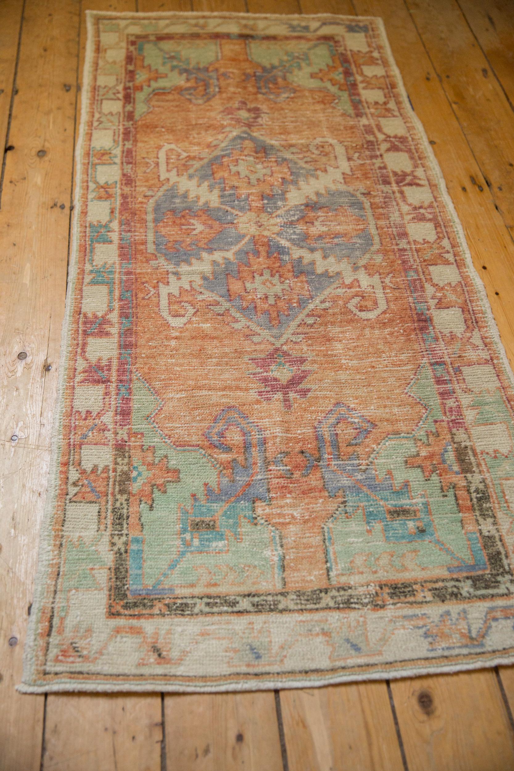 Mid-20th Century Vintage Distressed Oushak Rug Runner For Sale