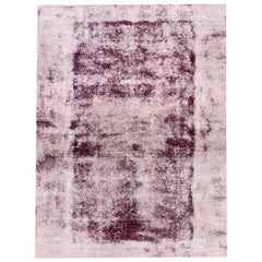 Alfombra persa vintage desgastada
