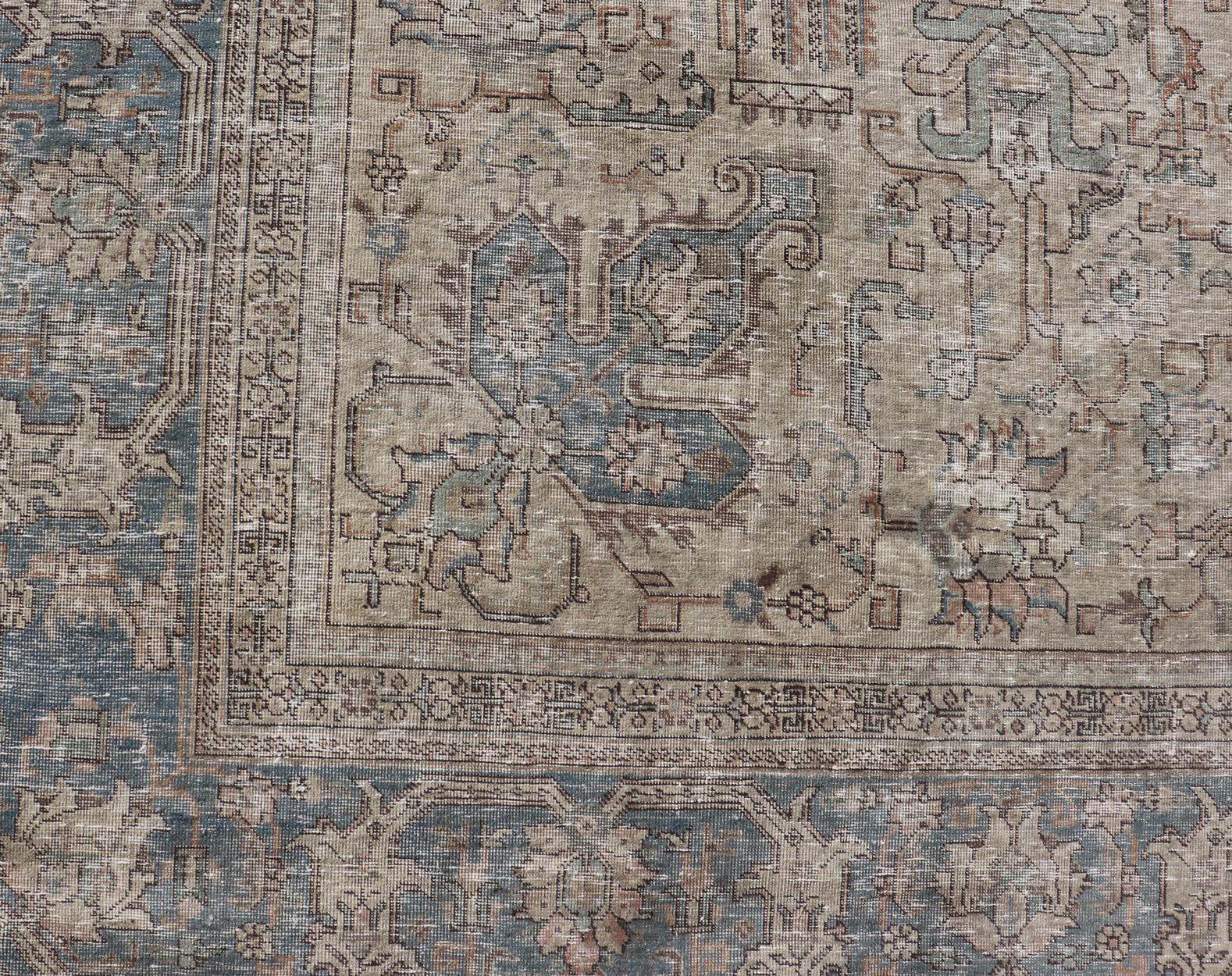 20th Century Vintage Distressed Persian Tabriz Rug in  Light Blue and Earth Tones For Sale