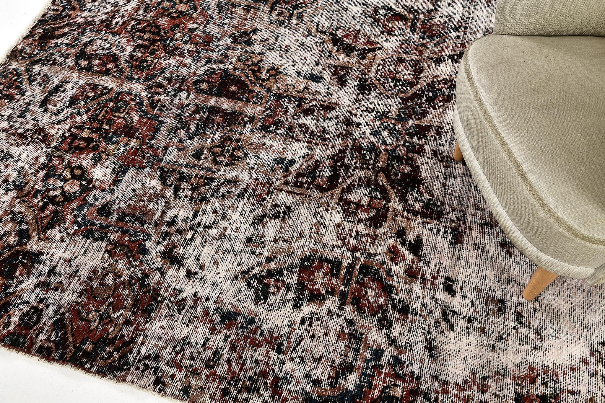You deserve to have a grandiose entrance with this timeless beauty of Bakhtiari Distressed Rug. A hand-spun wool Bakhtiari Rug is known for its durability and it is perfect at your doorsteps. A warm welcome from your guests that is absolutely a