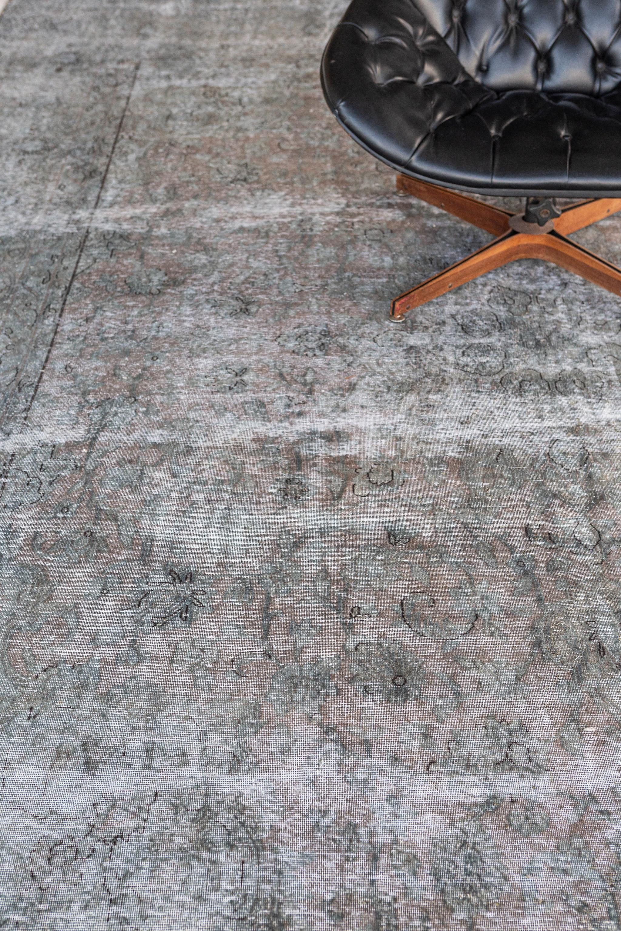 Mehraban of Los Angeles continues to speak to the modern design cues and needs with their distinctive vintage distressed rug collection. Sandra Espinet, is synonymous for her designer contemporary rugs, is the lead designer behind this piece.

Rug