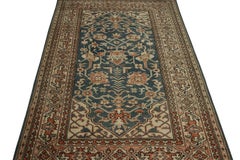 Alfombra vintage desgastada con motivos florales en azul, beige y óxido, by Rug & Kilim