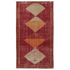 Tapis vintage vieilli en rouge avec médaillons en losange - Rug
Kilim